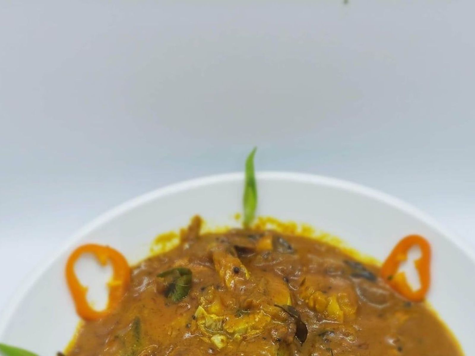 Order Vanjaram Fish Curry food online from Indian Cuisine store, Philadelphia on bringmethat.com