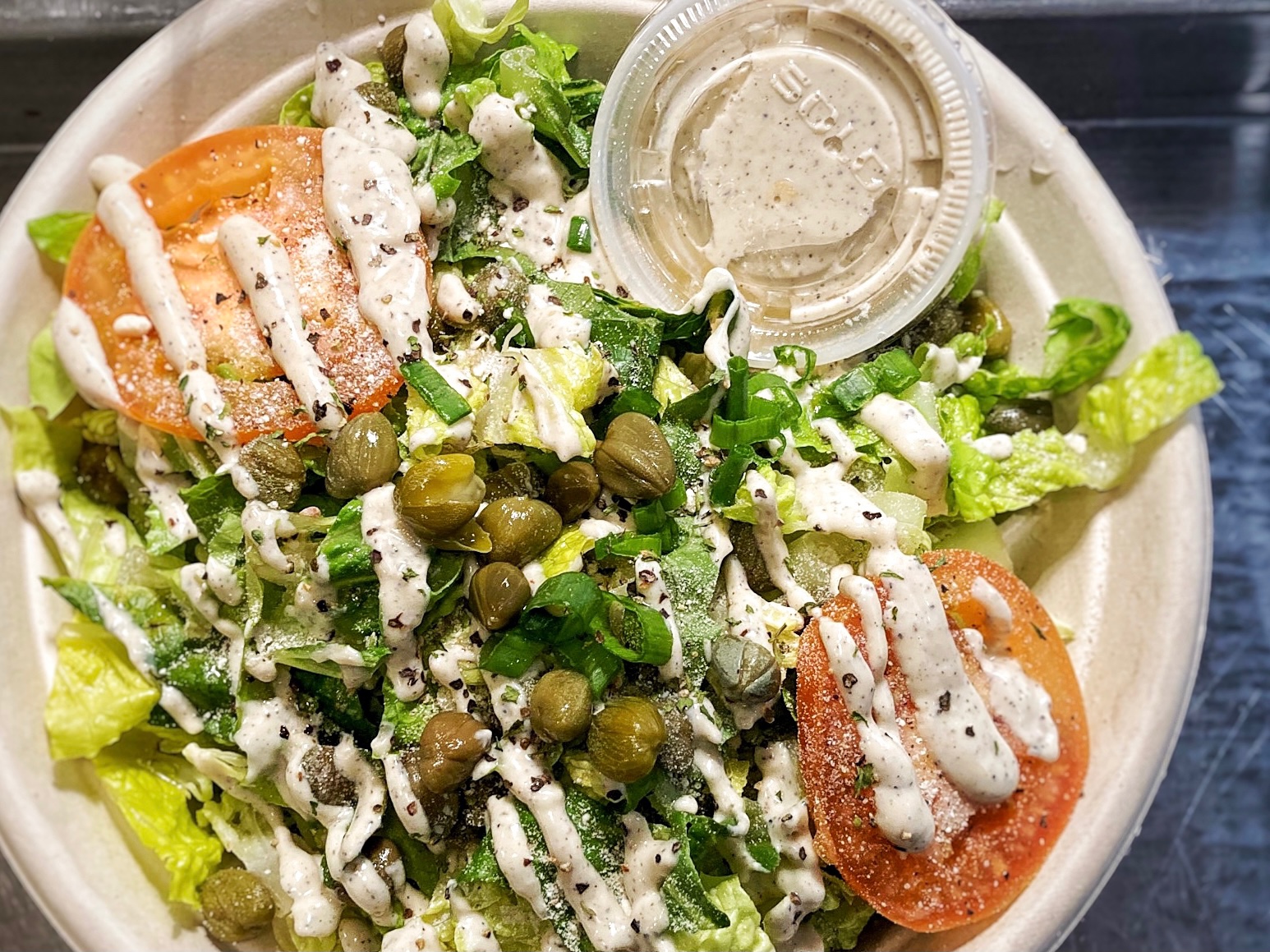 Order Caesar Salad food online from Bubbie Plant Burgers store, Washington on bringmethat.com