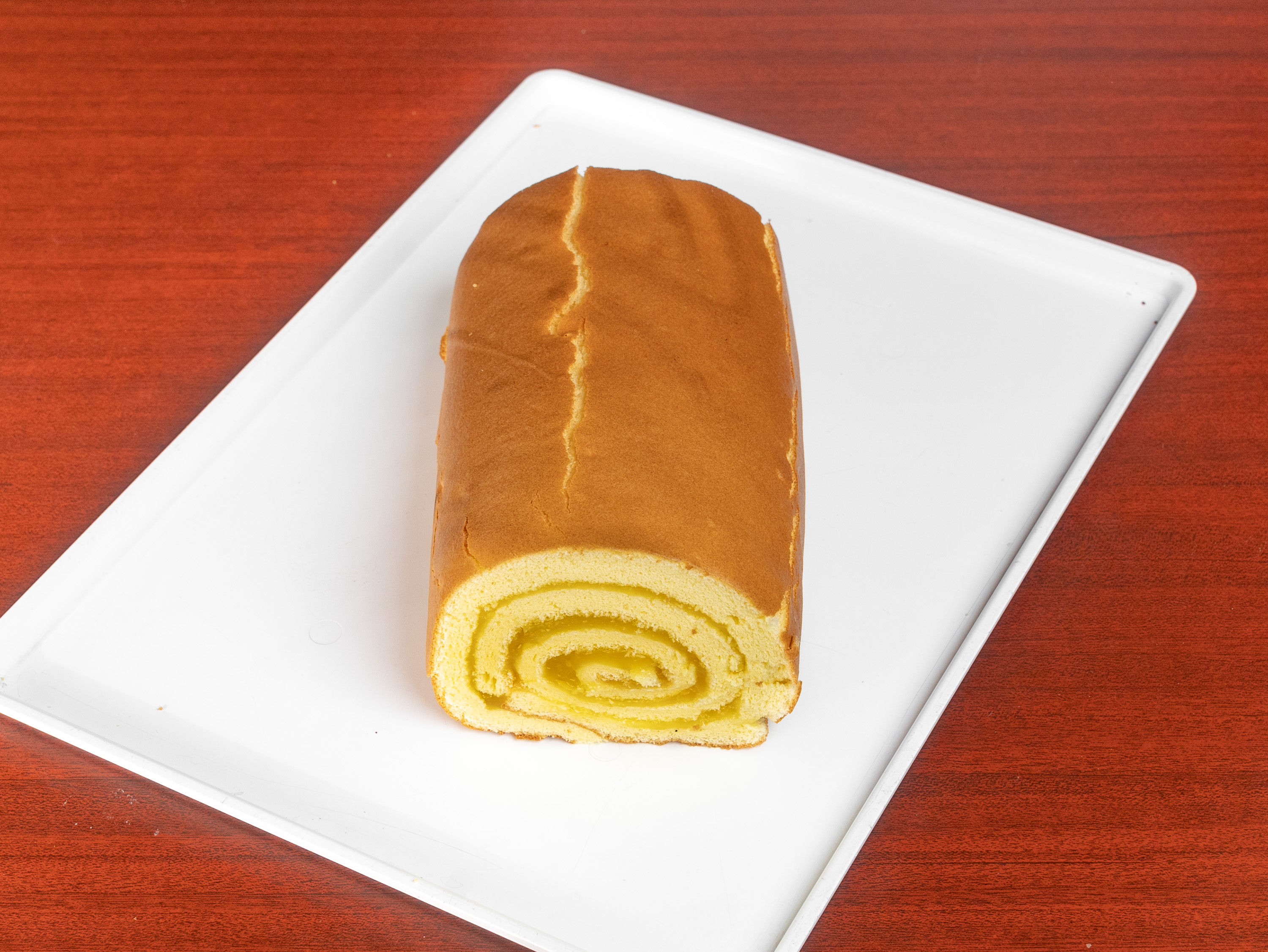 Order Whole Lemon Swiss Roll food online from Cherry Blossom Bakery store, San Francisco on bringmethat.com