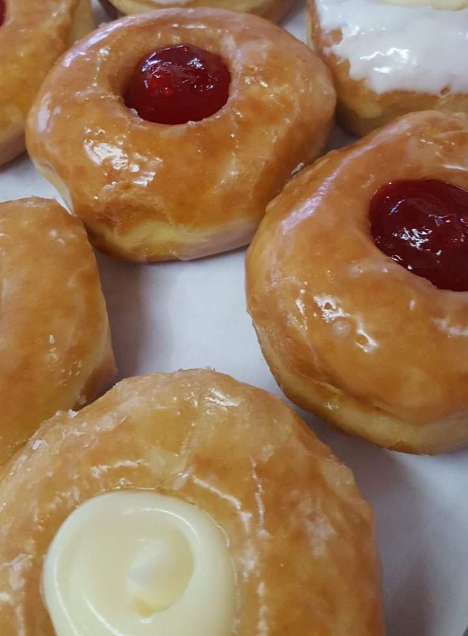 Order Glazed Donut with Filling food online from Leo Bakery store, Las Cruces on bringmethat.com