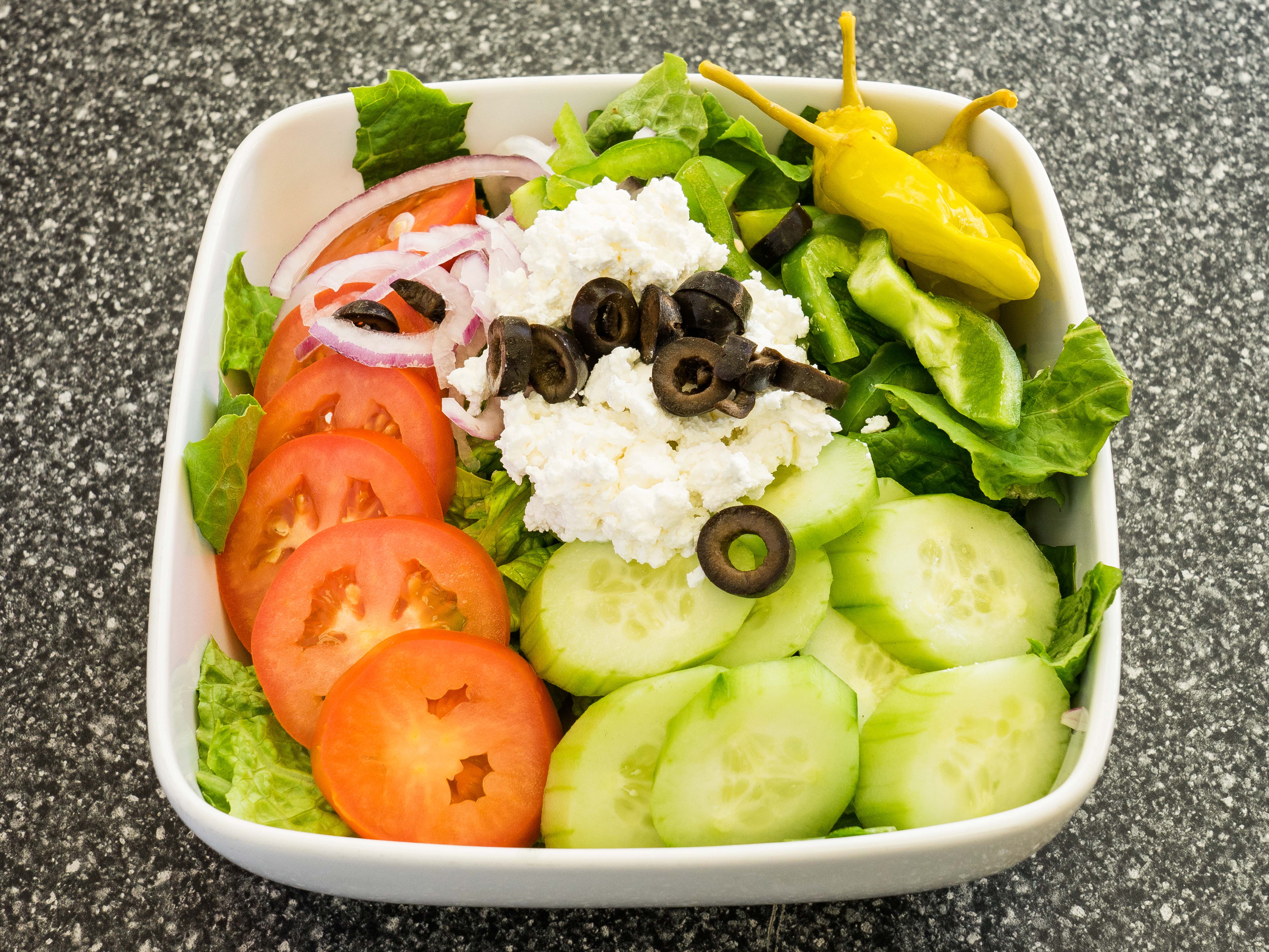 Order Greek Salad food online from San Clemente Pizza Co. store, San Clemente on bringmethat.com