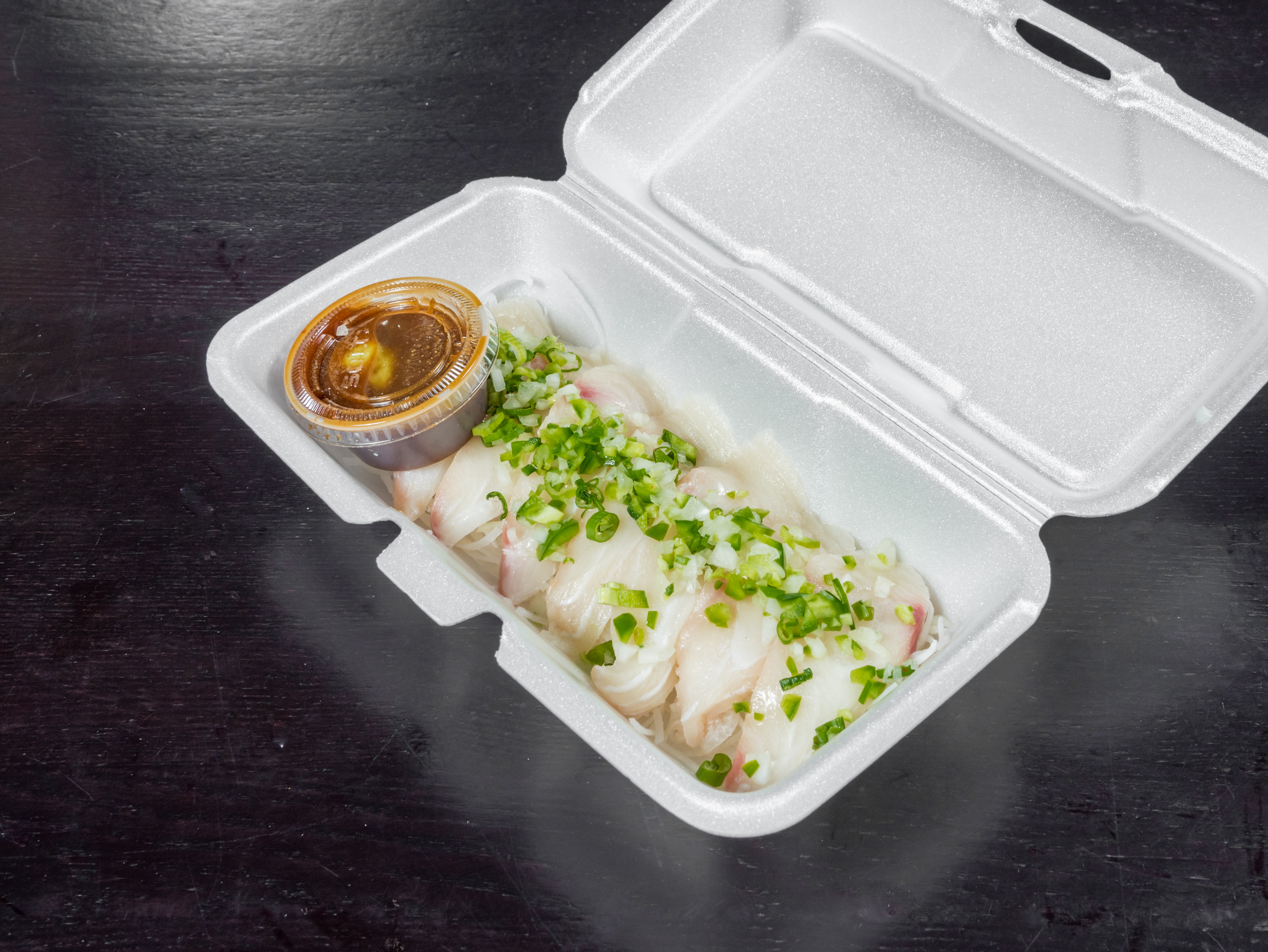 Order Hamachi (Yellow Tail) Carpaccio food online from Sushi Xuan store, Albuquerque on bringmethat.com