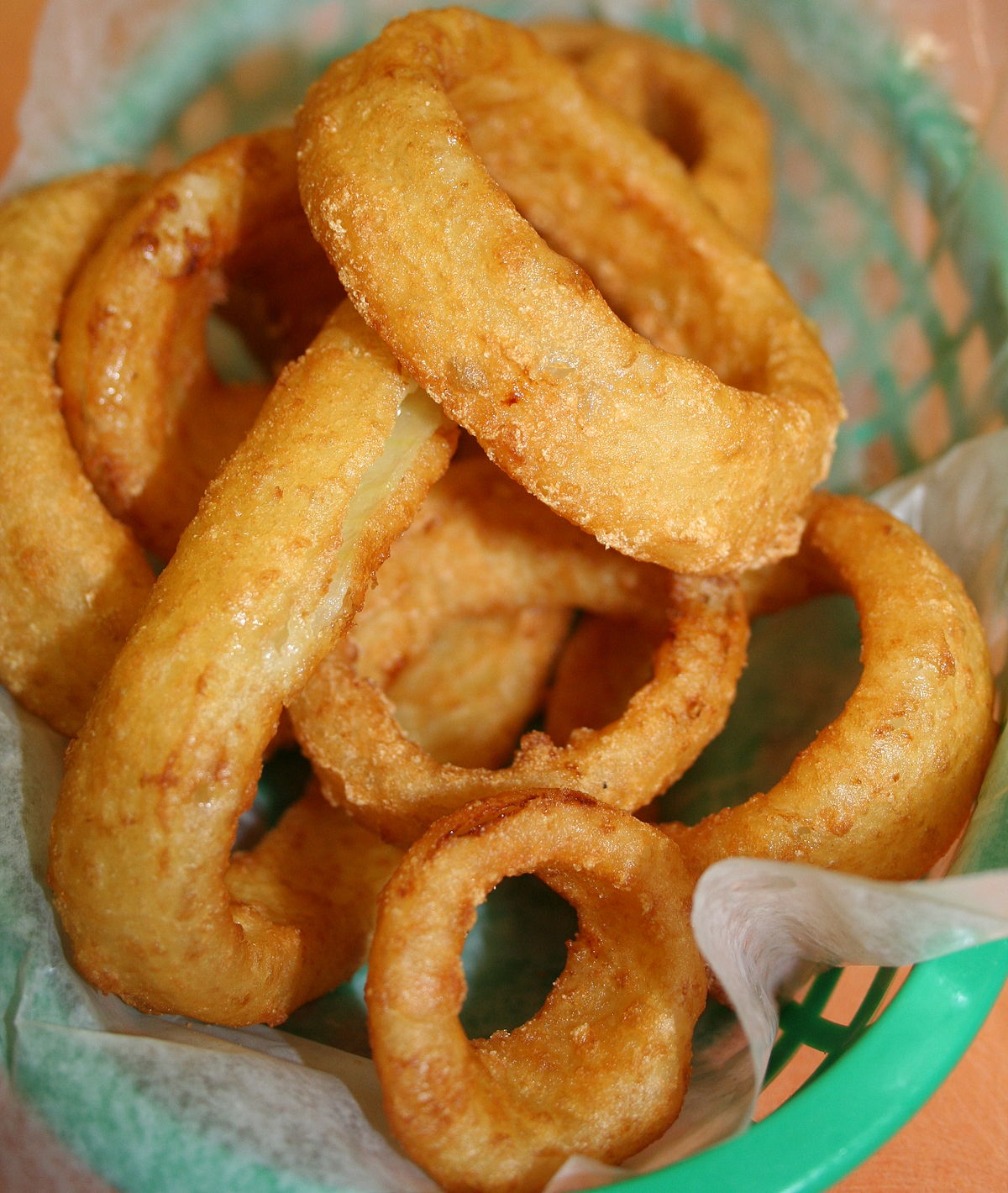 Order Onion Rings food online from Vino's Pizzeria store, Greensboro on bringmethat.com