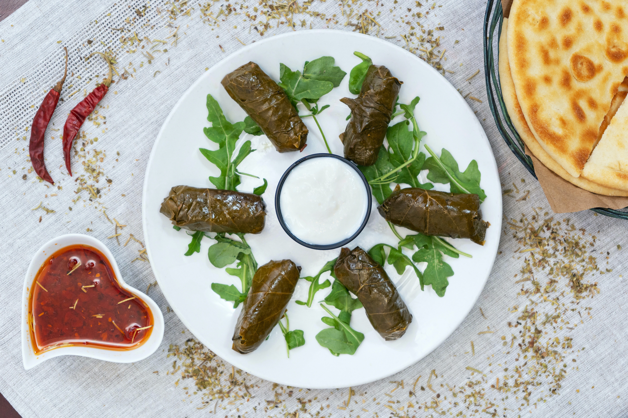 Order Stuffed Grape Leaves (Dolmas) food online from Istanbul Grill California store, Fountain Valley on bringmethat.com