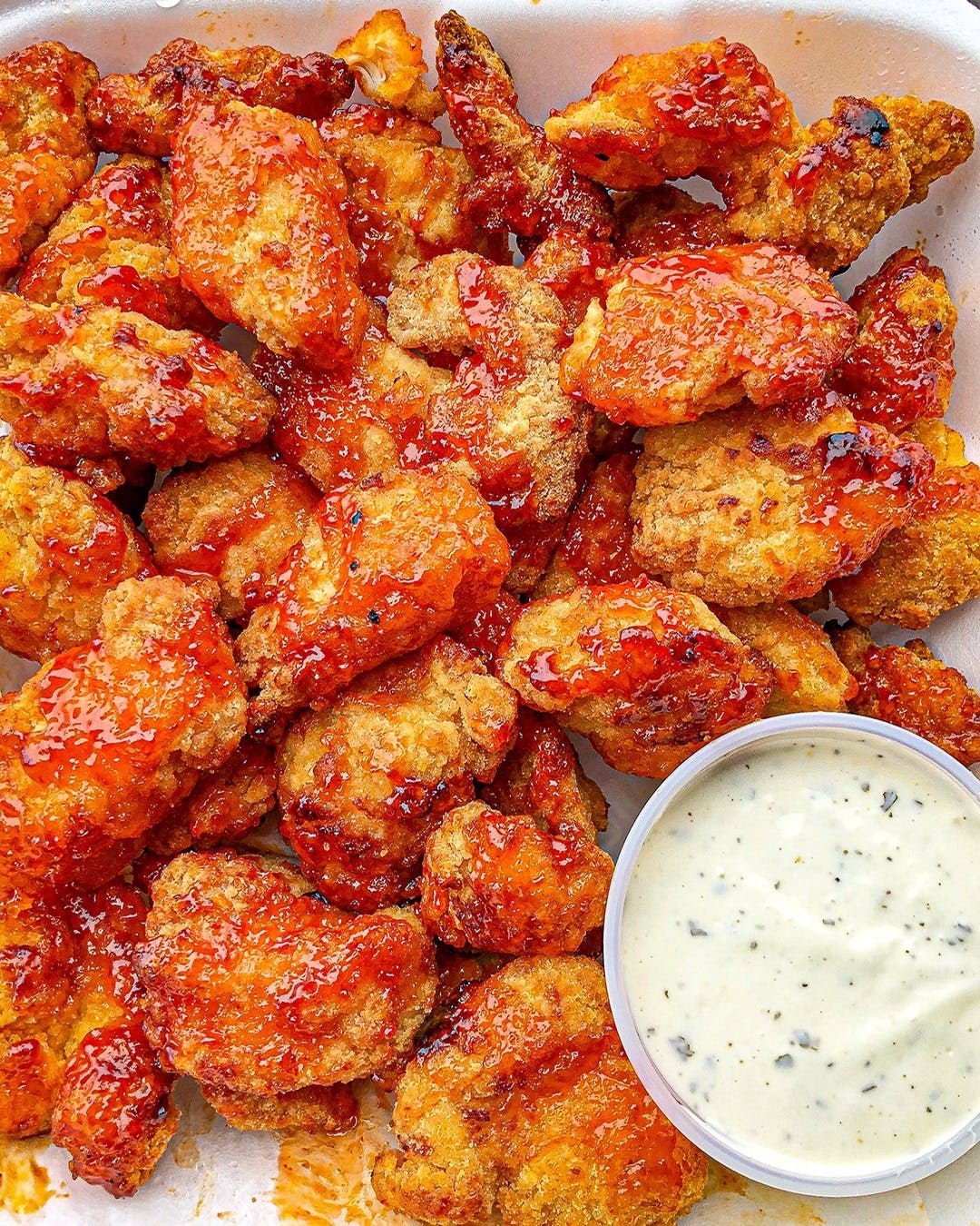 Order Hot Country Wings - 10 Pieces food online from Breadeaux Pizza store, Grimes on bringmethat.com