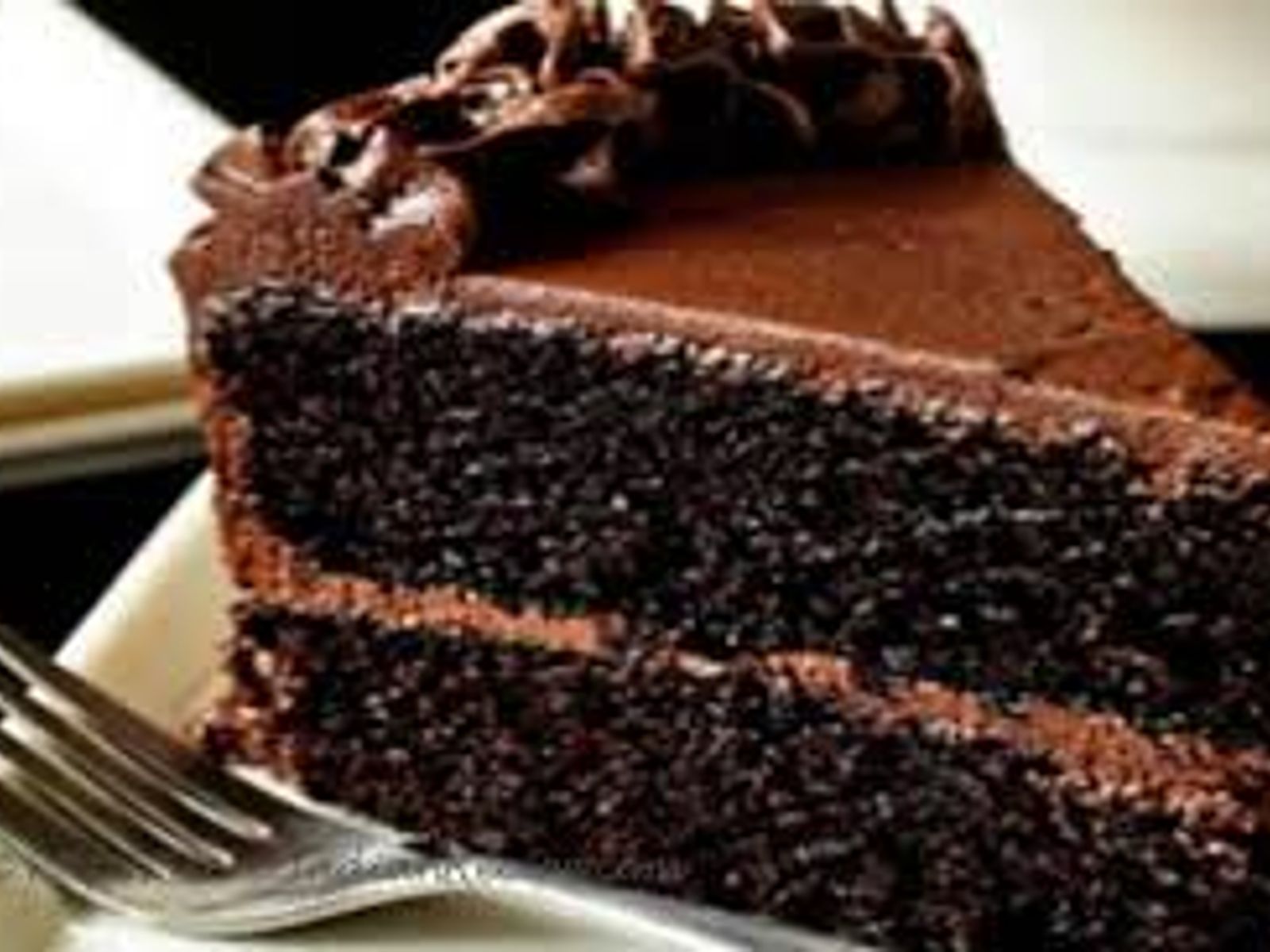 Order ULTIMATE CHOCOLATE CAKE food online from Super Crab Juicy Seafood store, Rochester on bringmethat.com