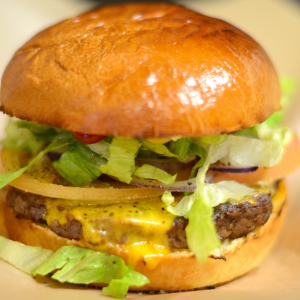 Order 8. Angus Beef Cheese Burger food online from Sutter St. Cafe store, San Francisco on bringmethat.com