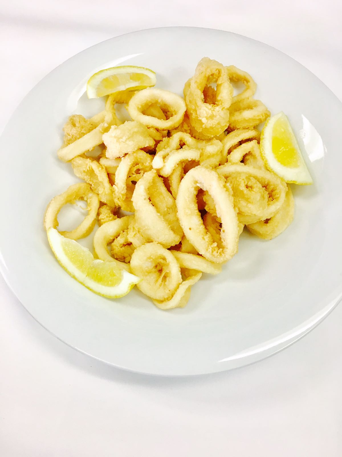 Order Fried Calamari food online from Lola Restaurant store, Trenton on bringmethat.com