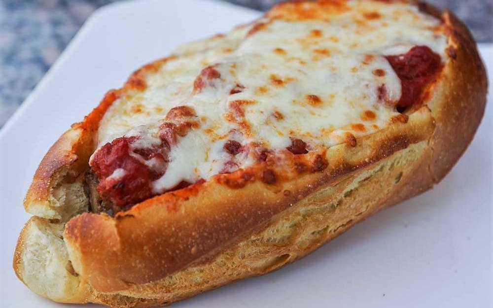 Order Meatball Parmigiana Sub - 7" food online from Pino's Pizzeria store, Easton on bringmethat.com