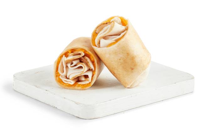 Order TURKEY & CHEDDAR WRAP food online from Tropical Smoothie Cafe store, Shenandoah on bringmethat.com