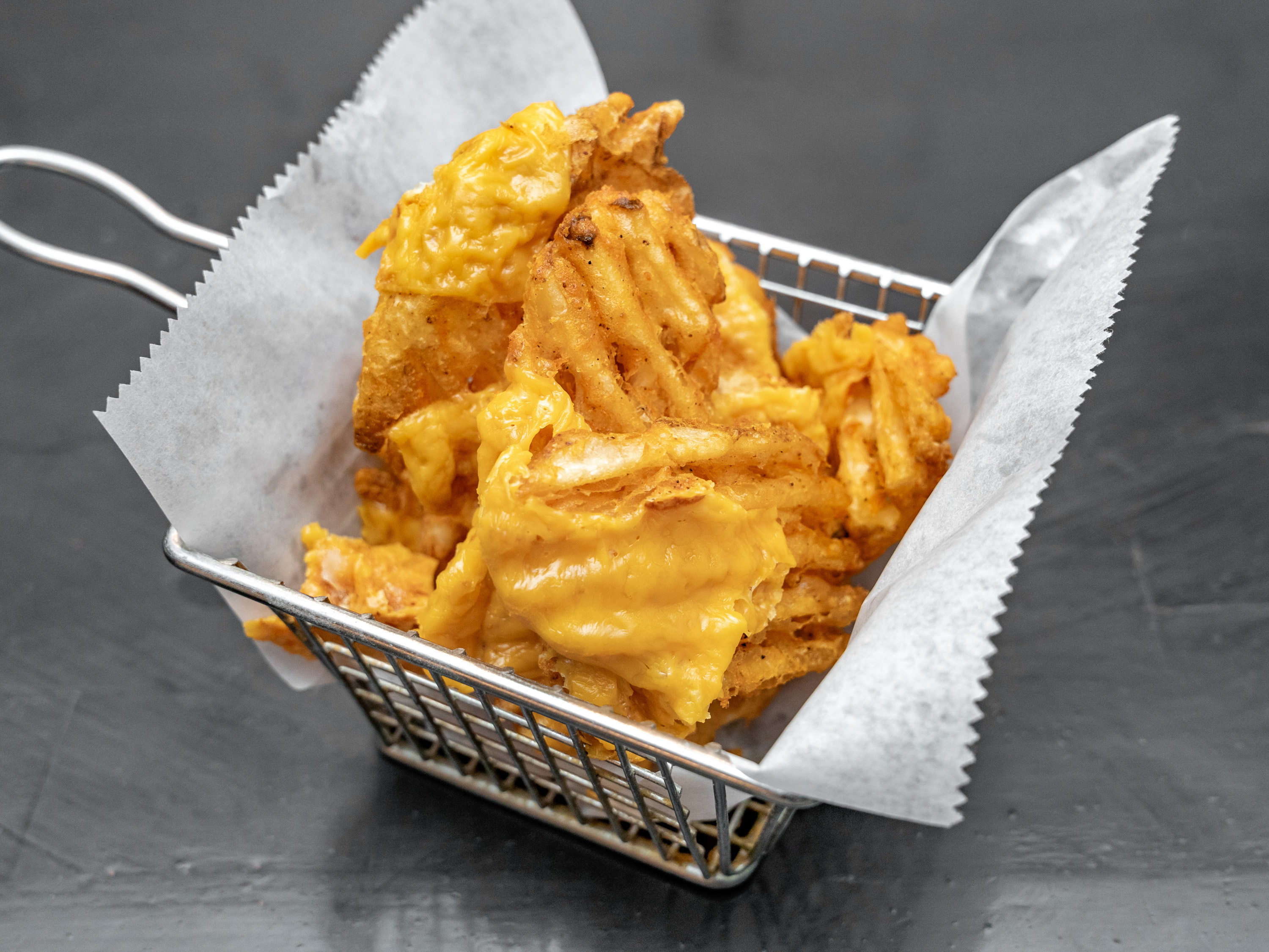 Order Cheese Fries food online from Hills Place store, Brooklyn on bringmethat.com