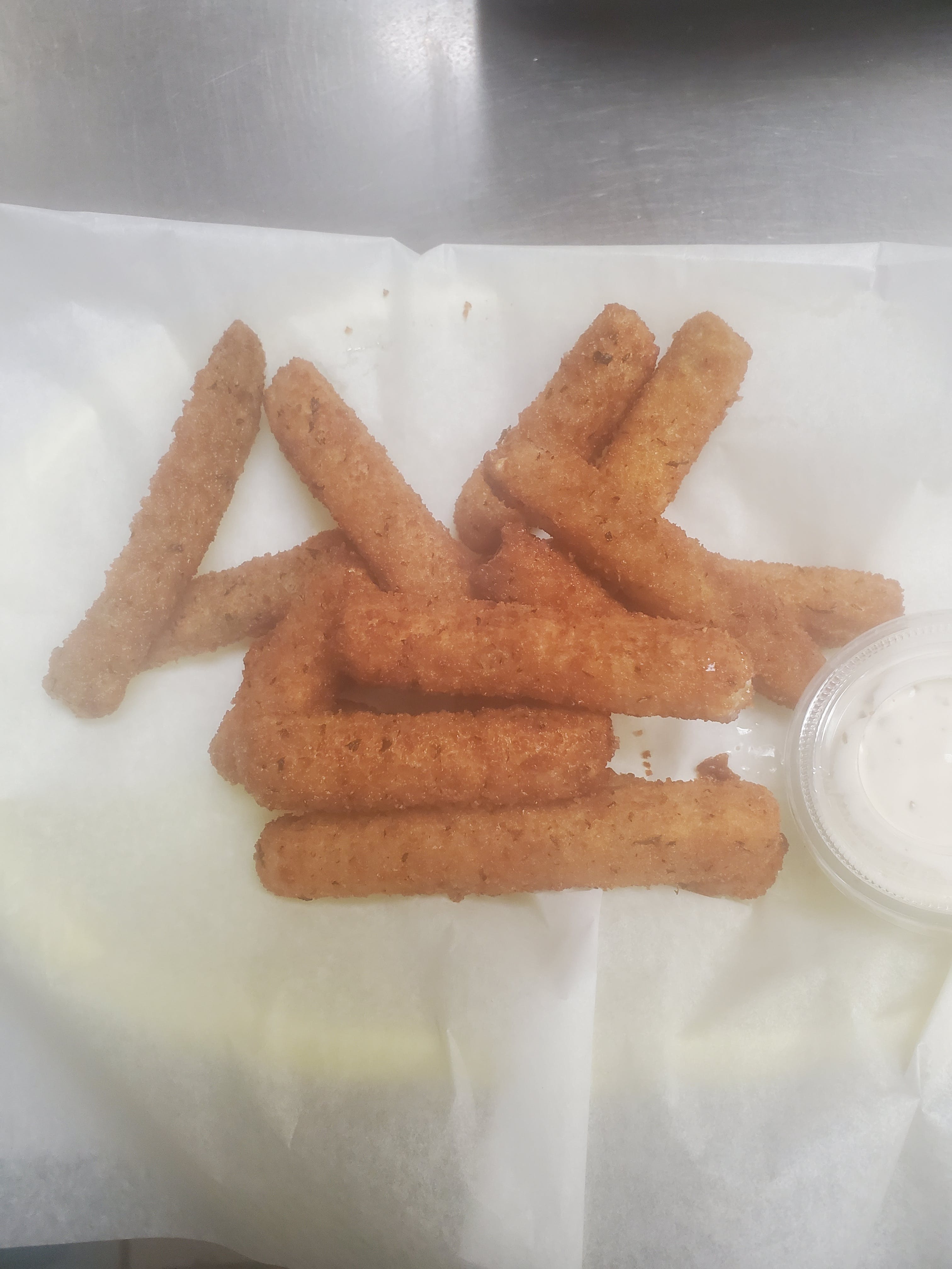 Order Breaded Zucchini Sticks - Appetizer food online from Pizza Cucina store, Oswego on bringmethat.com