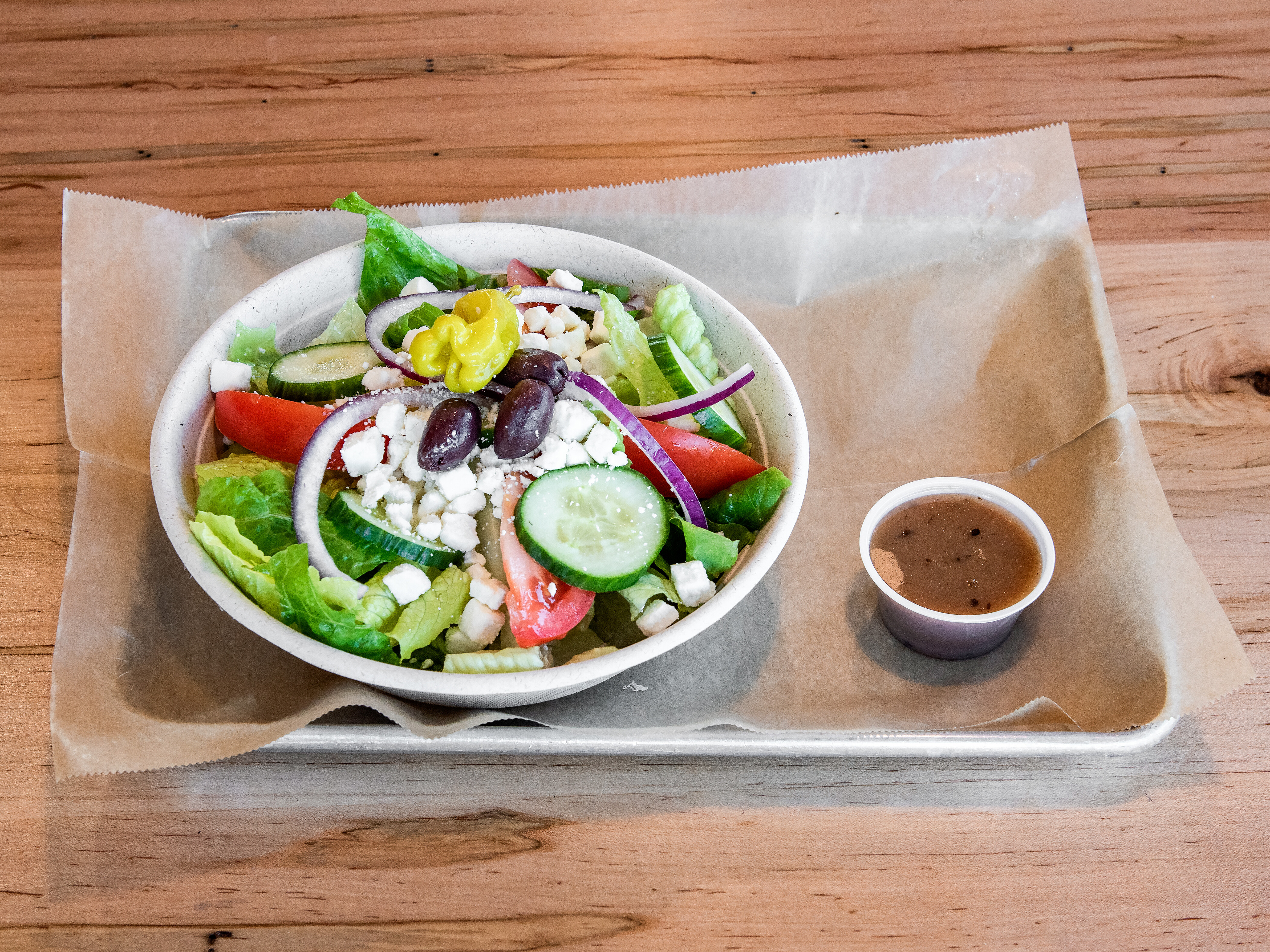 Order Greek Salad food online from Peno Mediterranean Grill store, Wilmington on bringmethat.com