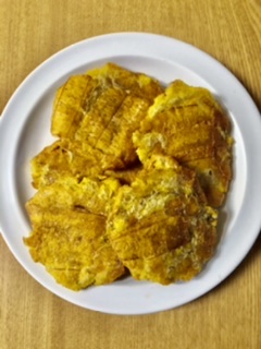 Order Fried Green Plantains / tostones food online from El Paisa Happy Chicken store, Newark on bringmethat.com