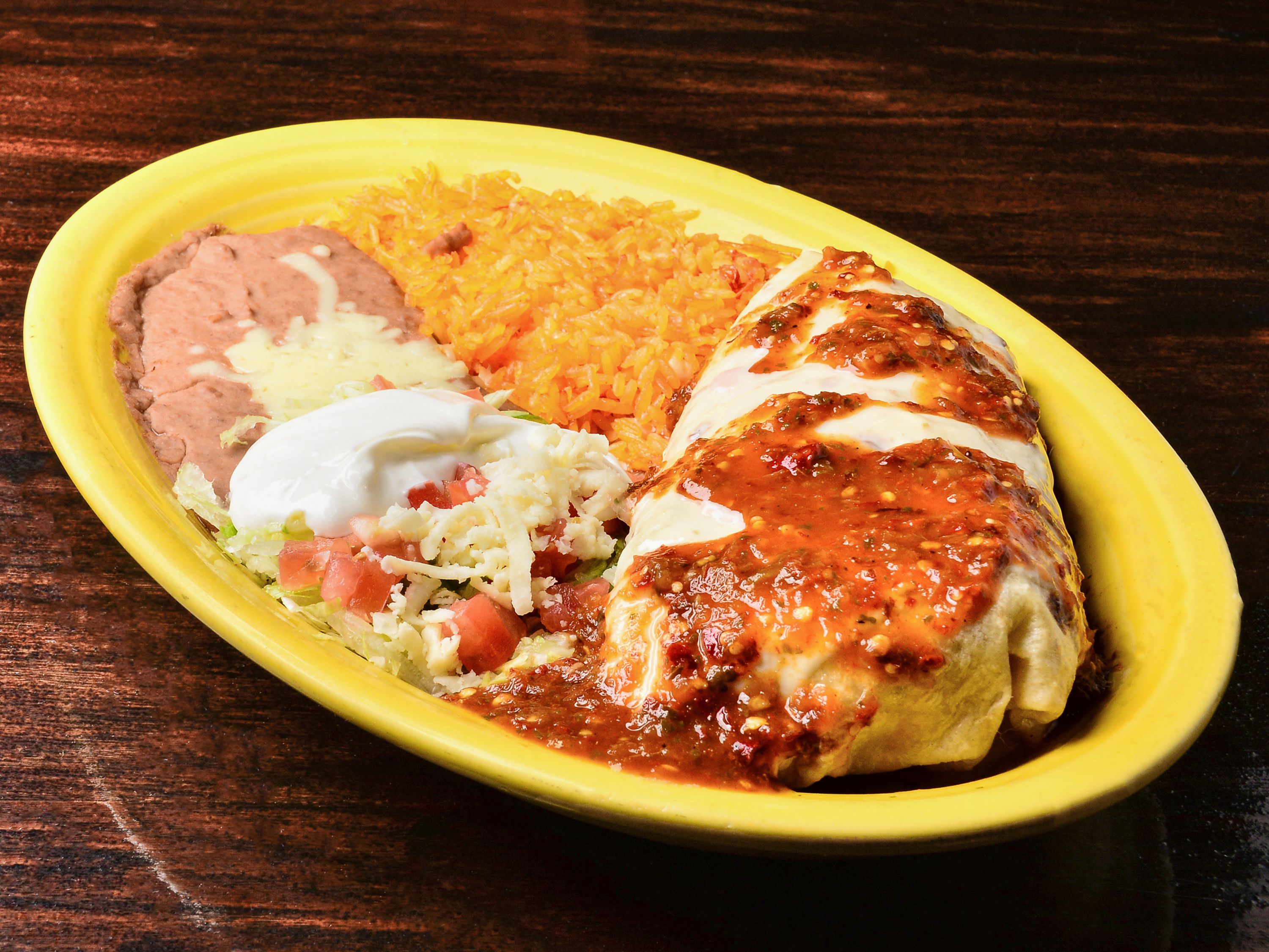 Order Spicy Burrito food online from El Herradero Mexican Grill store, Piqua on bringmethat.com