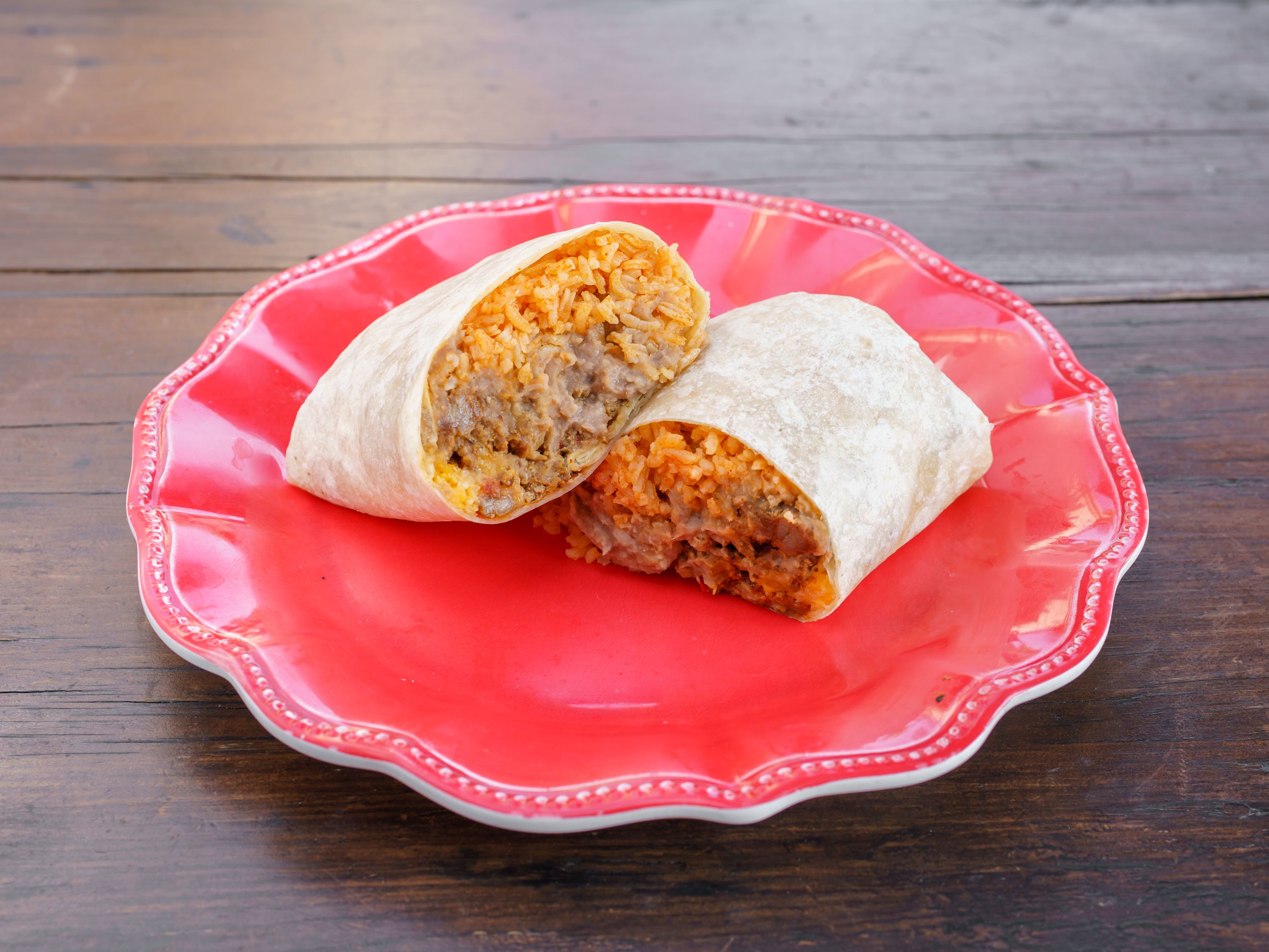 Order Carnitas Burrito food online from Cervantes Mexican Kitchen store, Anaheim on bringmethat.com