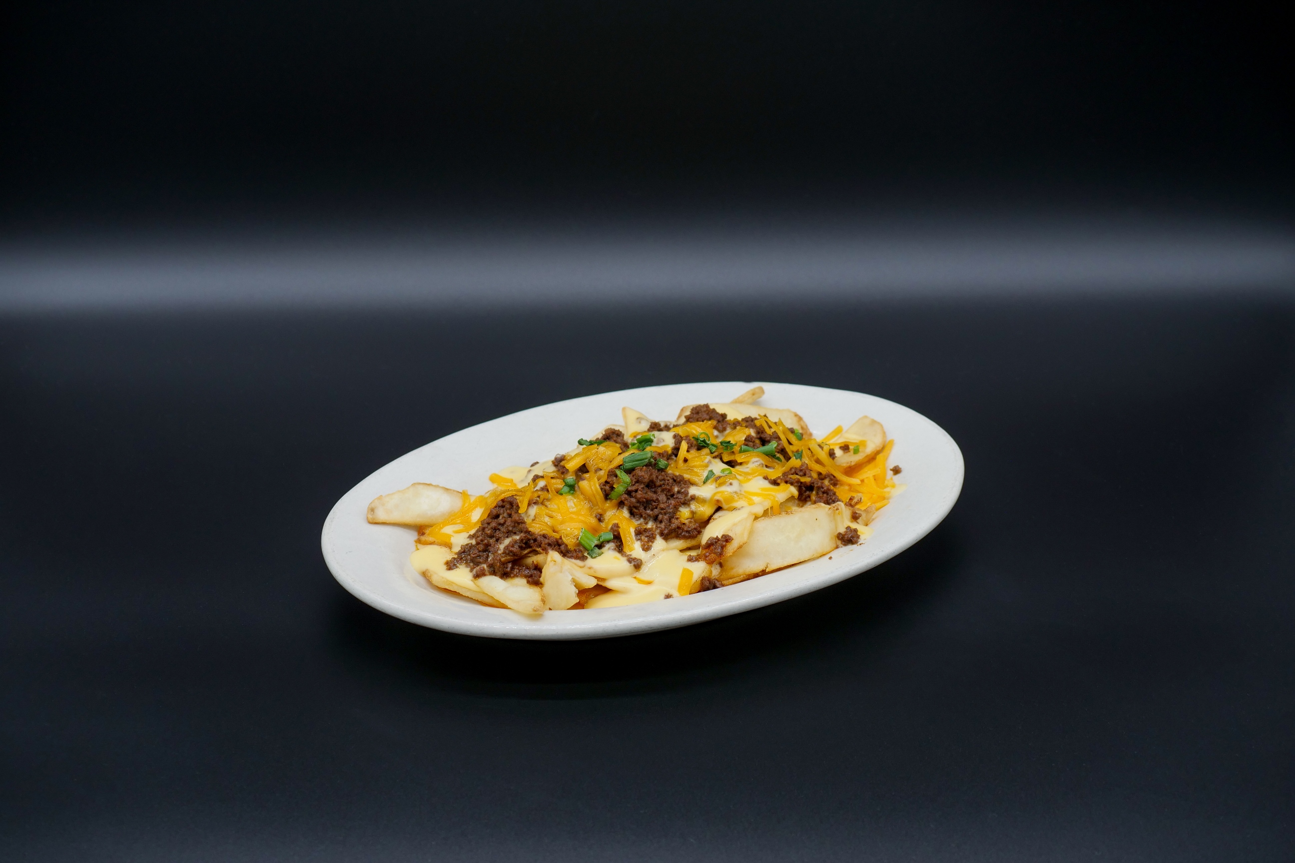 Order Chilli Cheese Fries food online from Dew Chilli Parlor store, Springfield on bringmethat.com