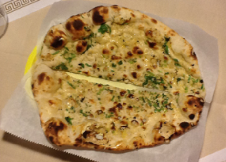 Order Garlic Naan food online from Bombay Bazar & Indian Restaurant store, North Charleston on bringmethat.com