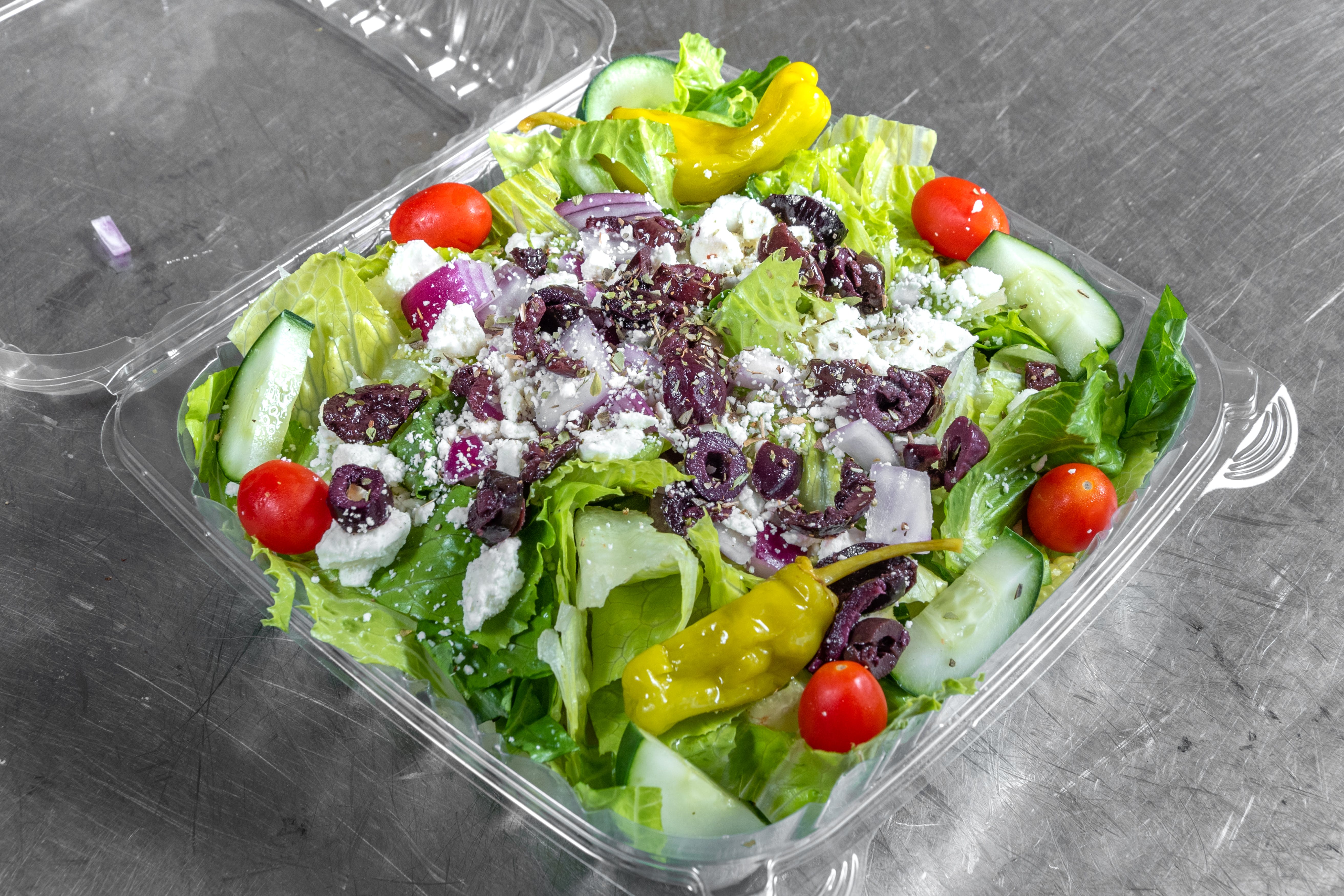 Order Greek Salad - Salad food online from Goodfella Pizza store, Los Lunas on bringmethat.com