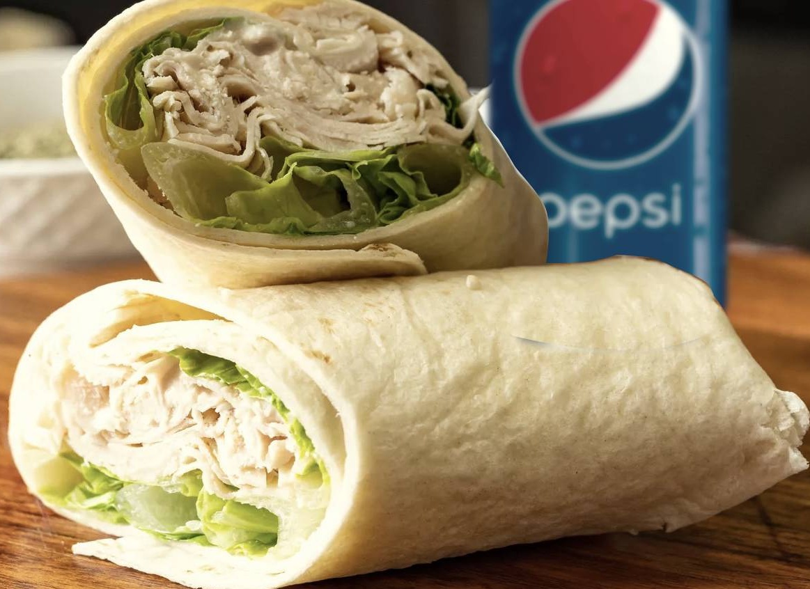 Order Chicken Ceasar Wrap and a 12oz Pepsi Product food online from Natasha's Wraps store, Washington on bringmethat.com