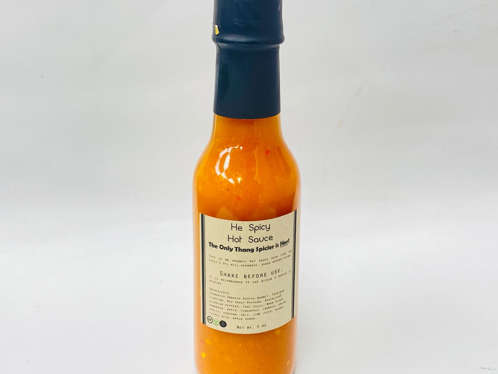 Order Bottled He Spicy Hot Sauce food online from Pinto Urban Thai Diner store, Richardson on bringmethat.com
