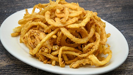 Order Fried Onions food online from Saltgrass Steak House store, Shenandoah on bringmethat.com