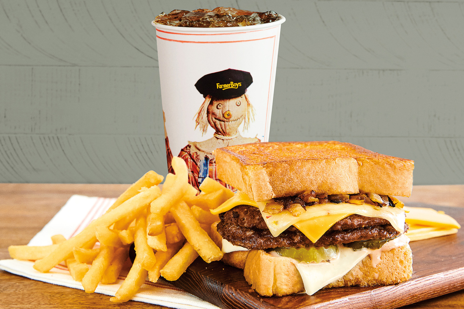 Order Cheesy Lover’s Burger Melt - Double Combo food online from Farmer Boys store, Northridge on bringmethat.com