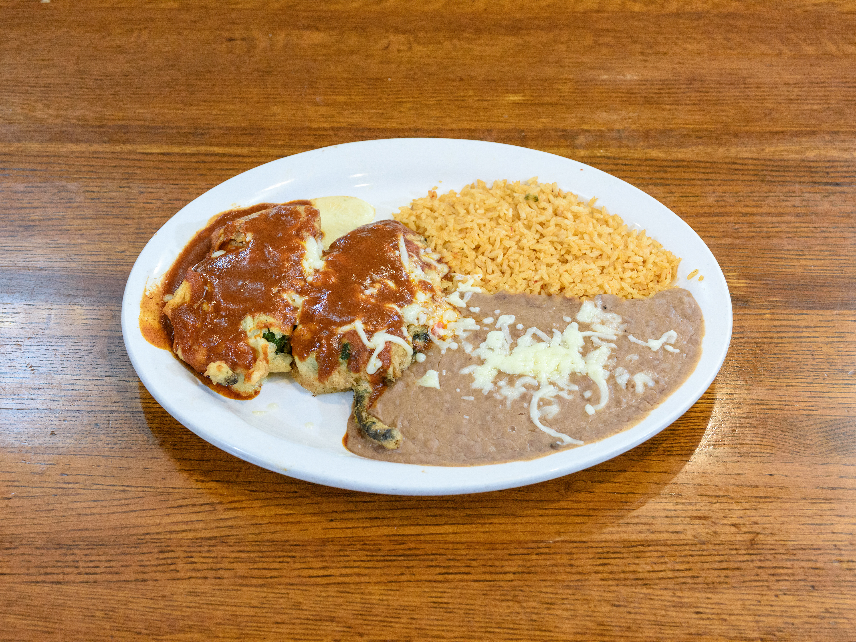 Order Chiles Rellenos Poblanos food online from Los Aztecas store, Louisville on bringmethat.com