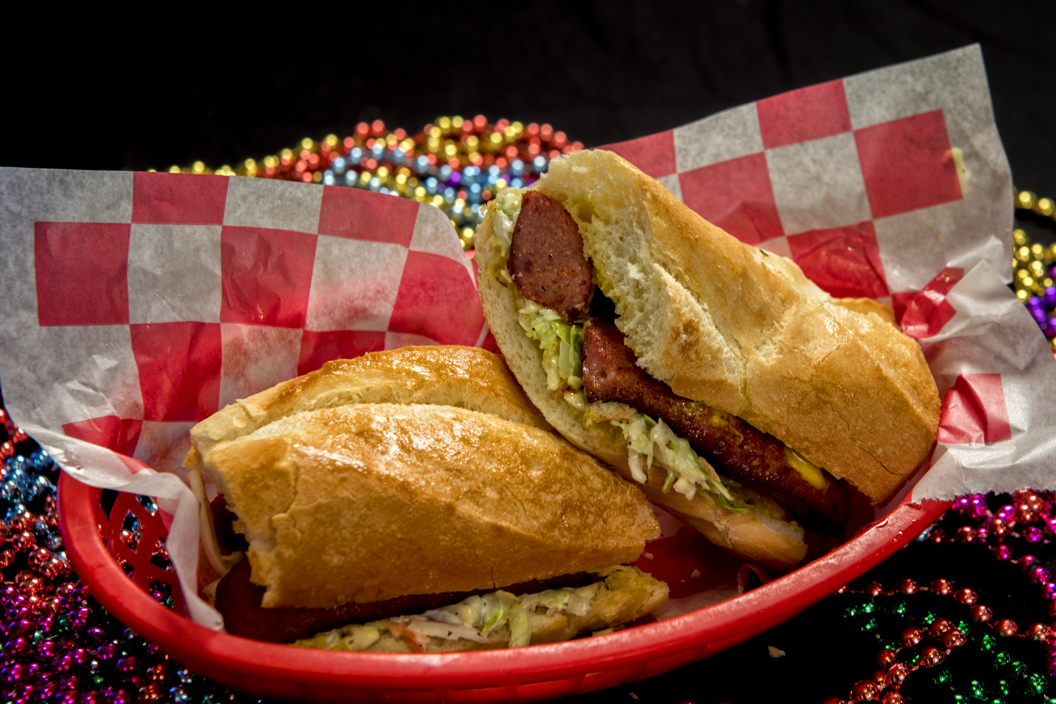 Order Spicy Cajun Sausage Po' Boy food online from The Lost Cajun store, Fort Collins on bringmethat.com