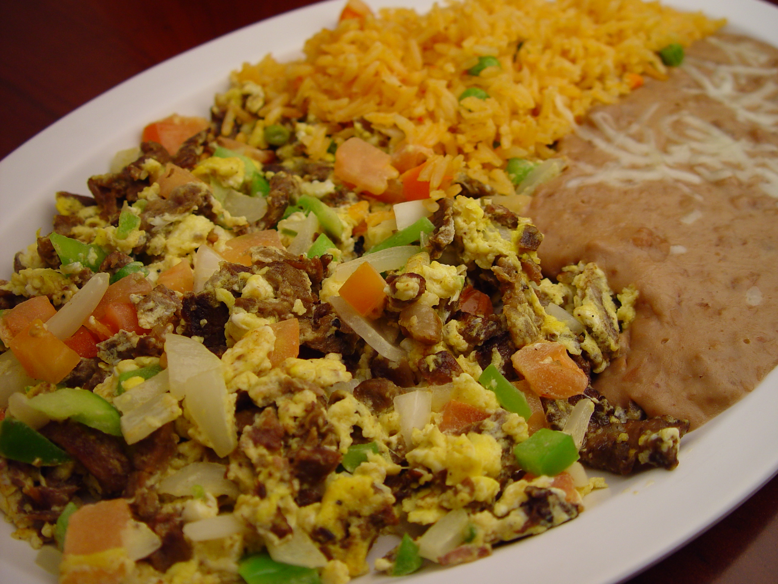 Order 14. Huevos con Carne Asada food online from Rodeo Mexican Grill store, Los Angeles on bringmethat.com