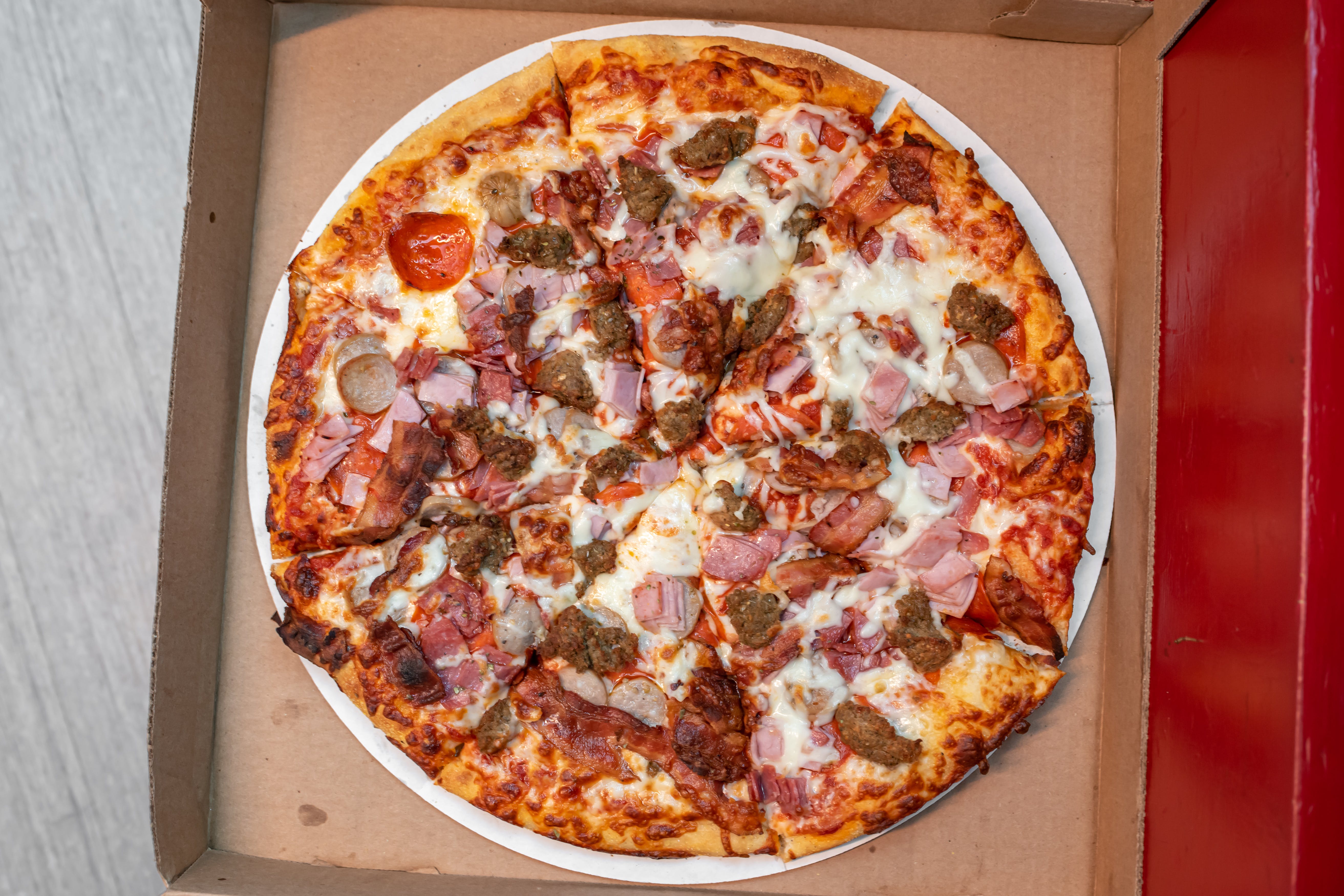 Order Meat Lover's Pizza - Small food online from Jitto's Super Steak store, Portsmouth on bringmethat.com