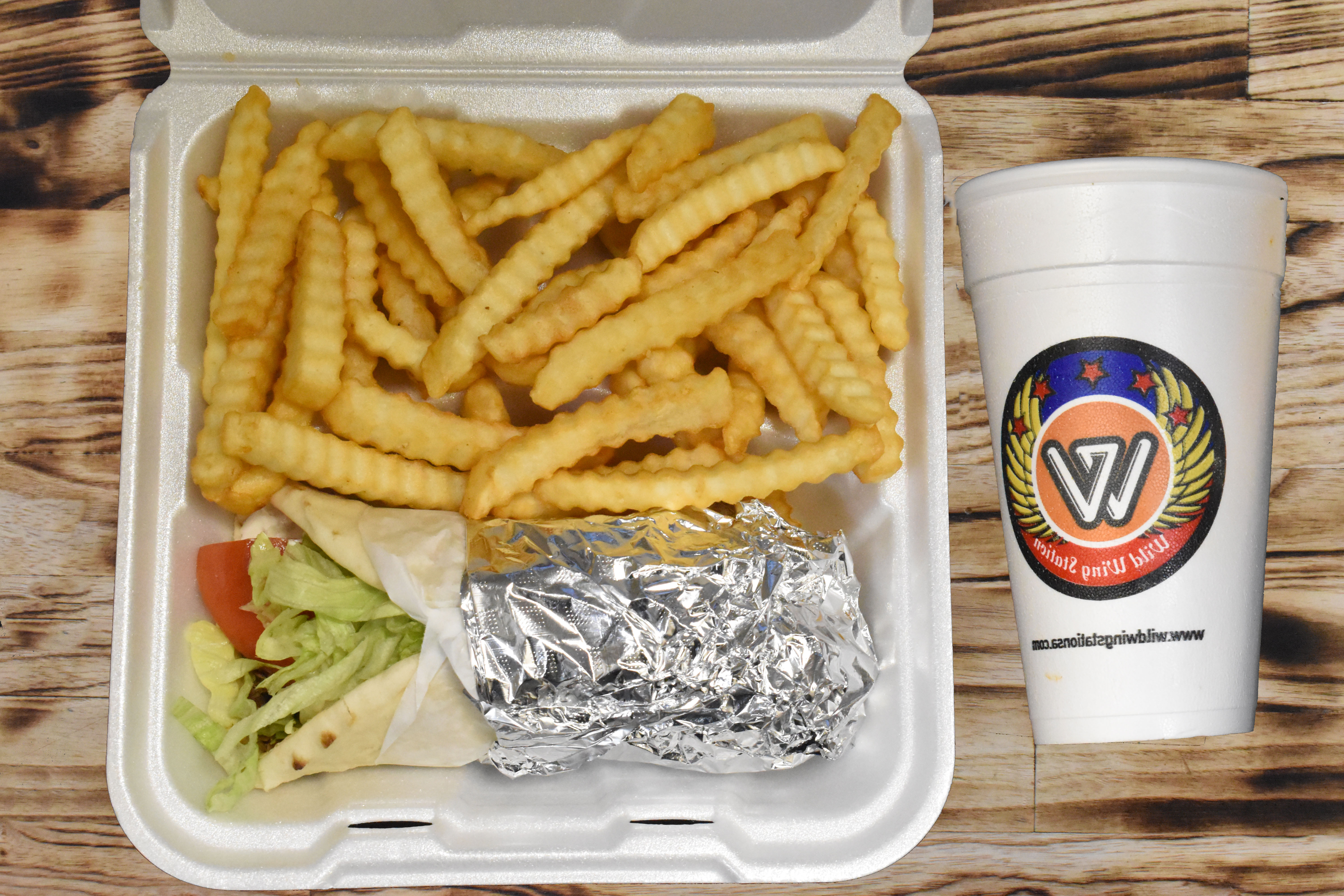 Order Gyro with Fries and Drink food online from Wild Wing Station store, San Antonio on bringmethat.com