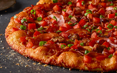 Order Hearty Bacon Supreme food online from Round Table Pizza store, San Jose on bringmethat.com