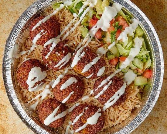 Order falafel over rice and salad  food online from Kennedy Chicken & Gyro store, New York on bringmethat.com