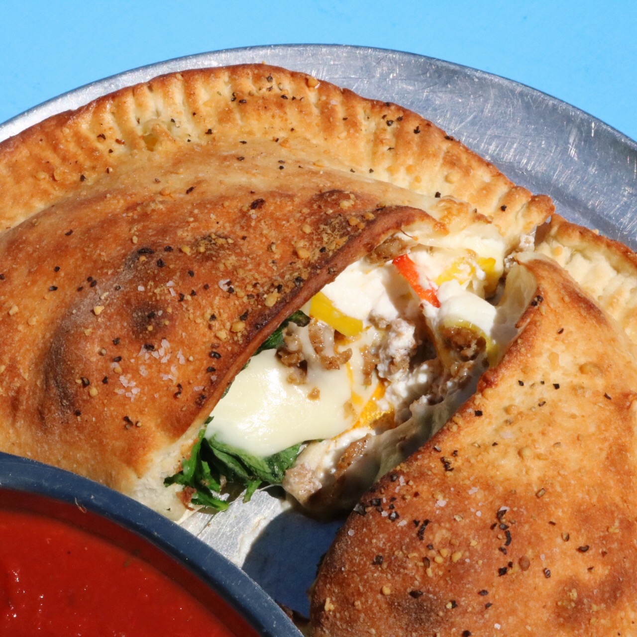 Order Calzone food online from Blue Moon Pizza store, Atlanta on bringmethat.com