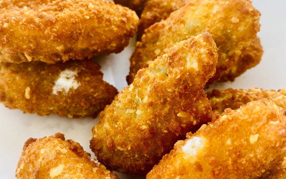 Order Jalapeno Poppers - Appetizer food online from Your Pizza Shop store, Canton on bringmethat.com