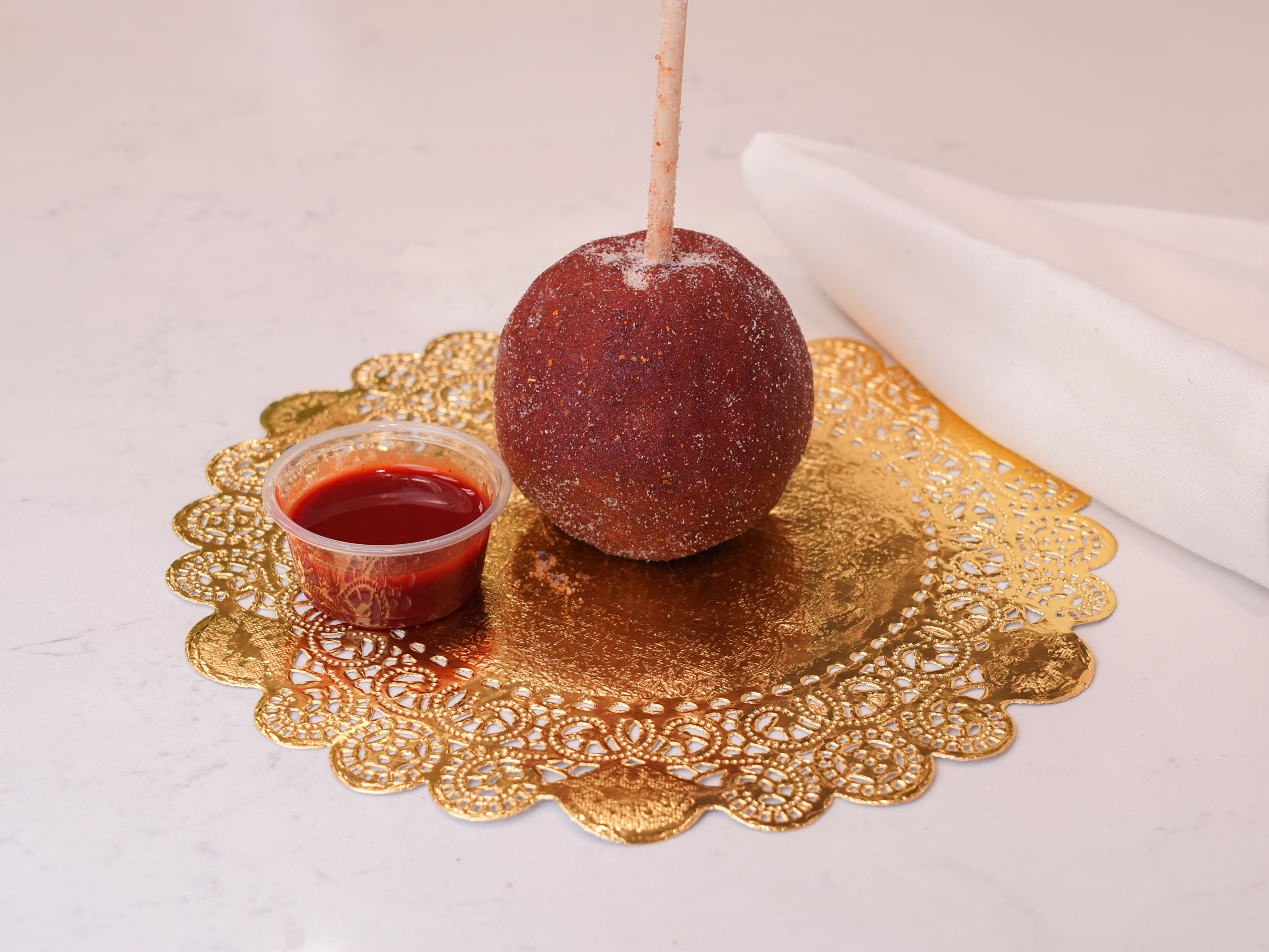 Order Chamoy Apple food online from Chocolate Wishes And Treats store, Clovis on bringmethat.com