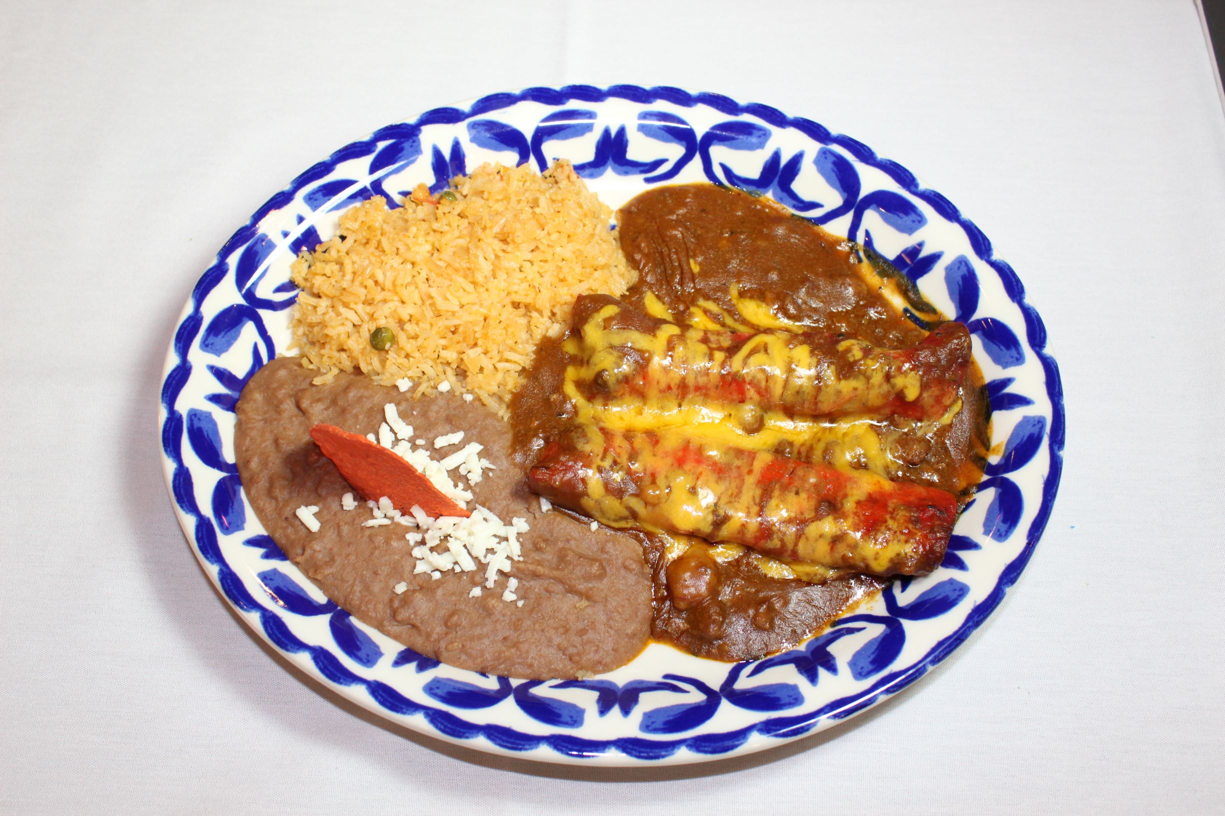 Order Enchiladas San Antonio food online from Mi Familia At The Rim store, San Antonio on bringmethat.com