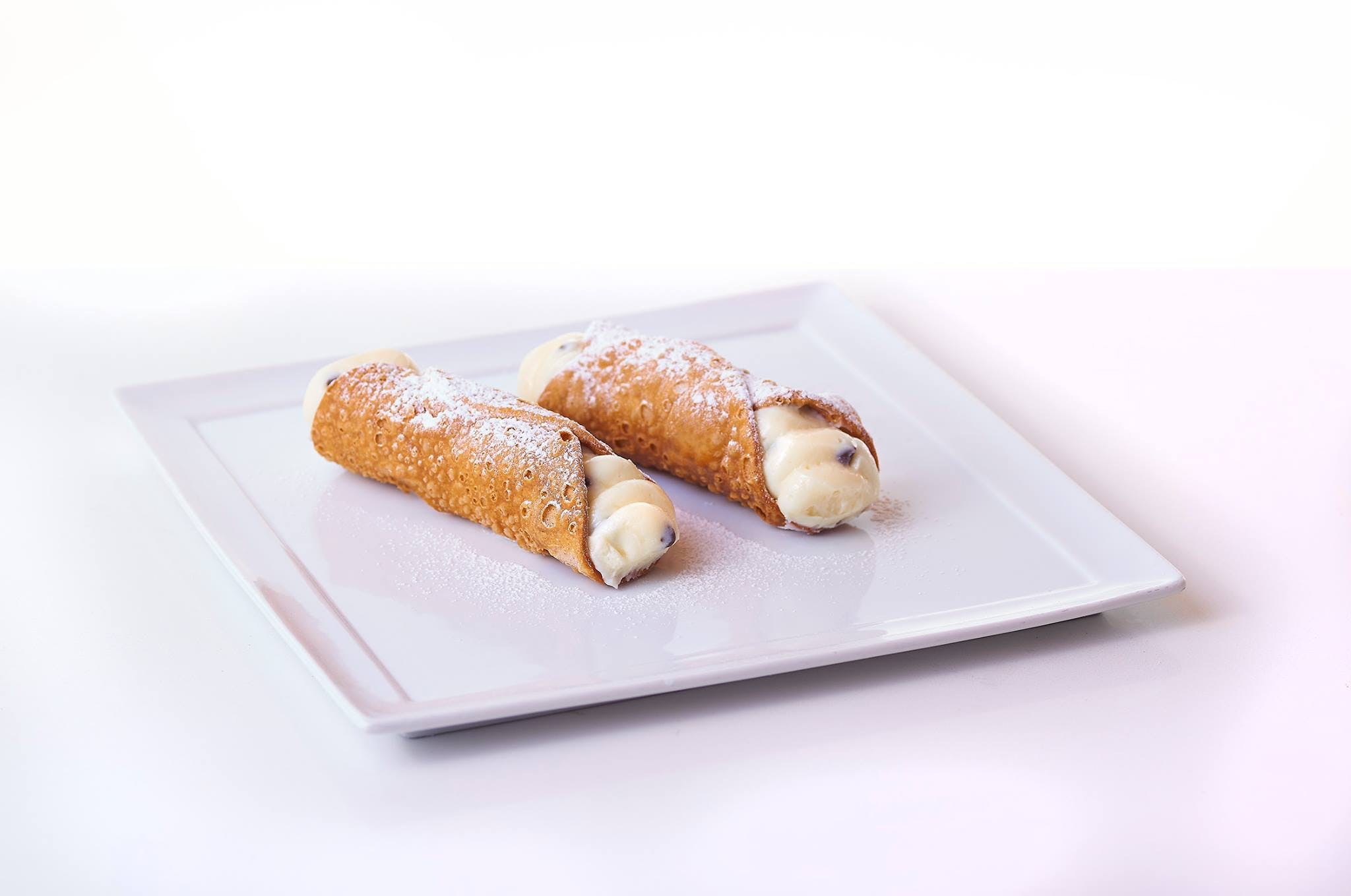 Order Cannoli - 1 Piece food online from Paisano Pizza store, Alexandria on bringmethat.com