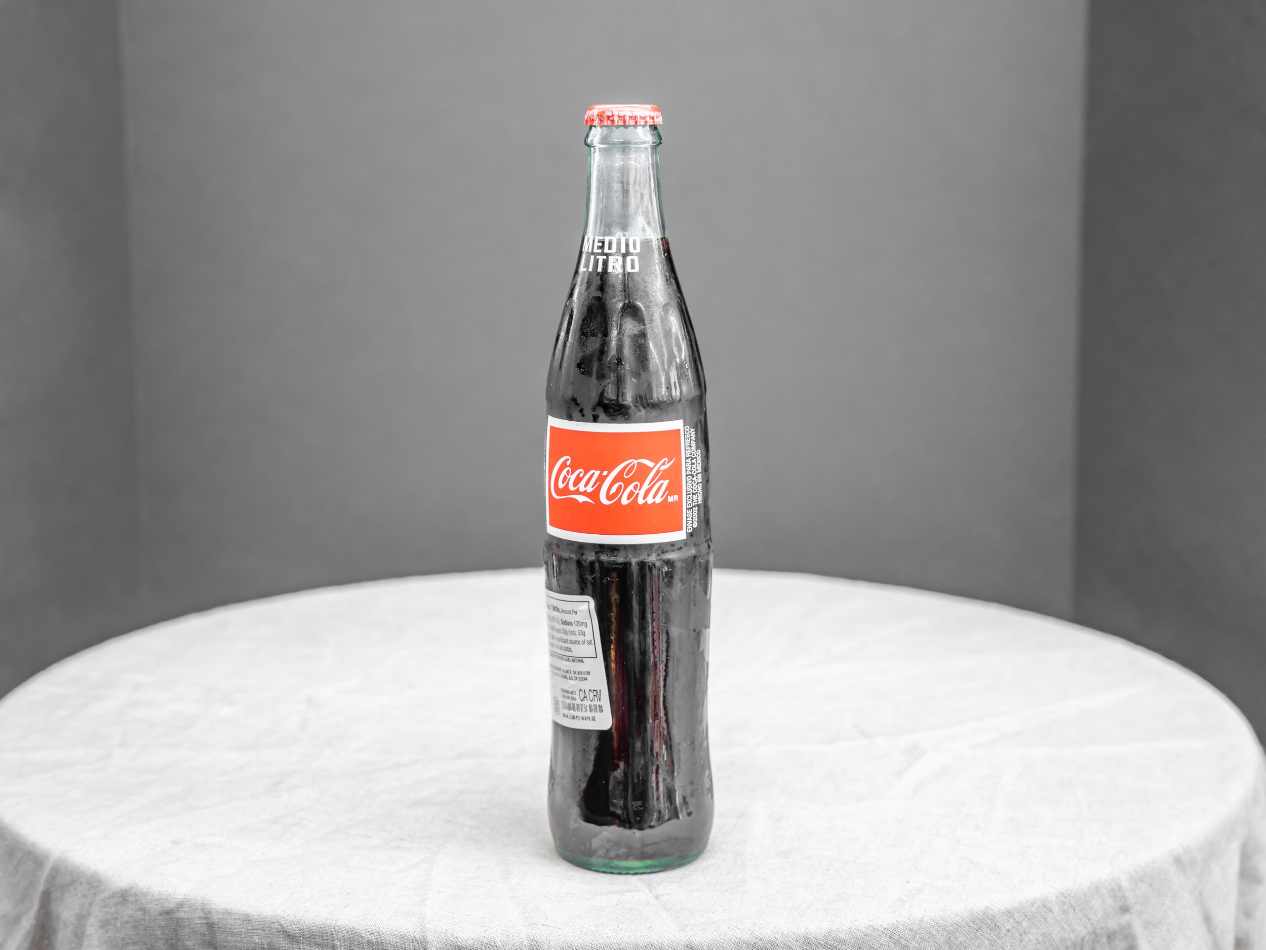 Order Bottled of Coca Cola Glass food online from Bistro Liquor store, Huntington Beach on bringmethat.com