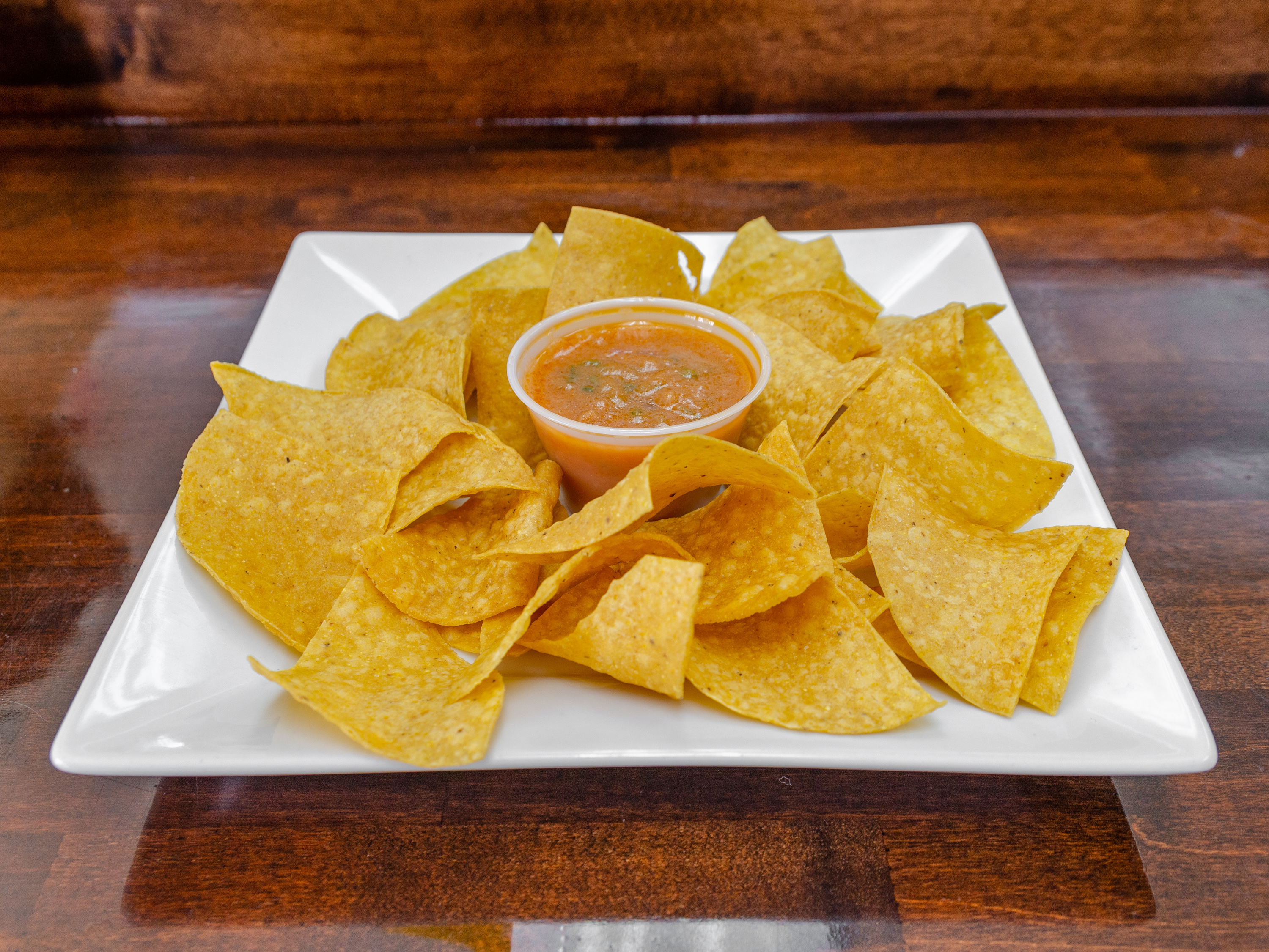 Order 4oz. Salsa and Chips food online from Avila Taqueria & Restaurant store, West New York on bringmethat.com