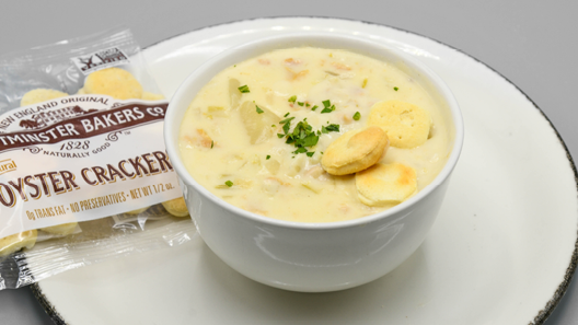 Order New England Clam Chowder (Cup) food online from Mitchell's Fish Market store, Livonia on bringmethat.com