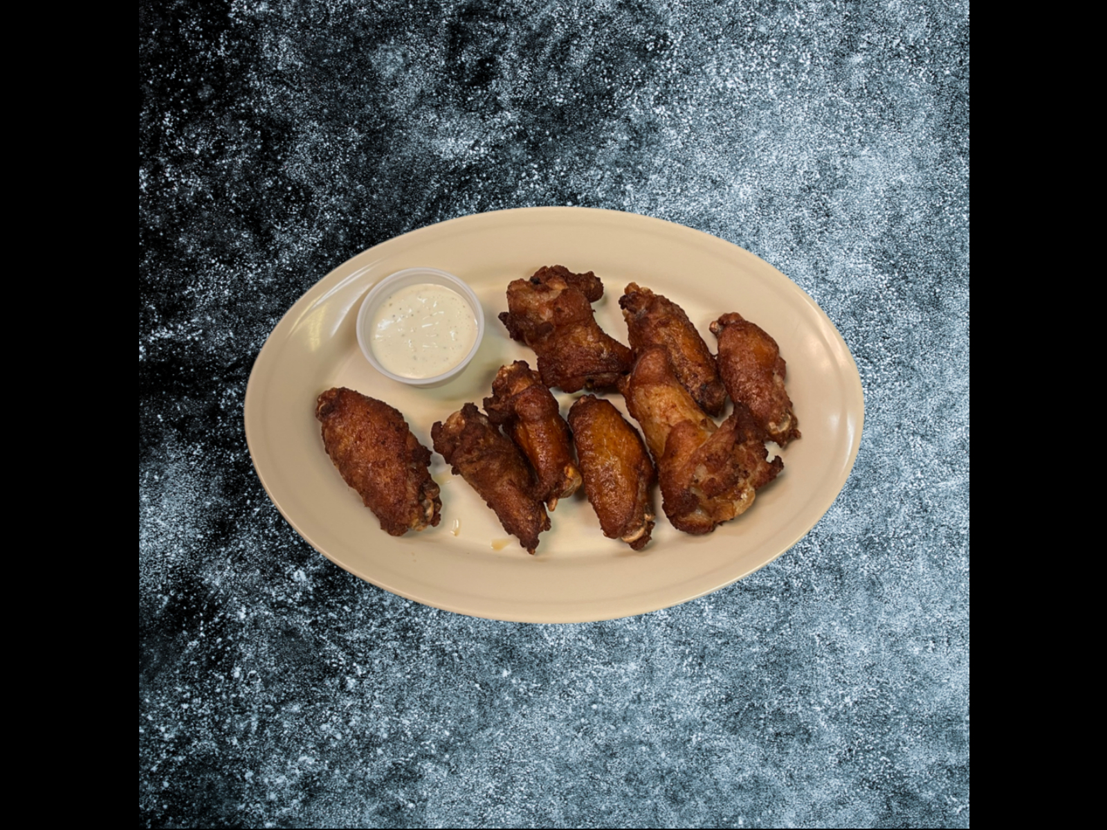 Order 24 Wings* food online from The Slice Pizzeria store, San Antonio on bringmethat.com