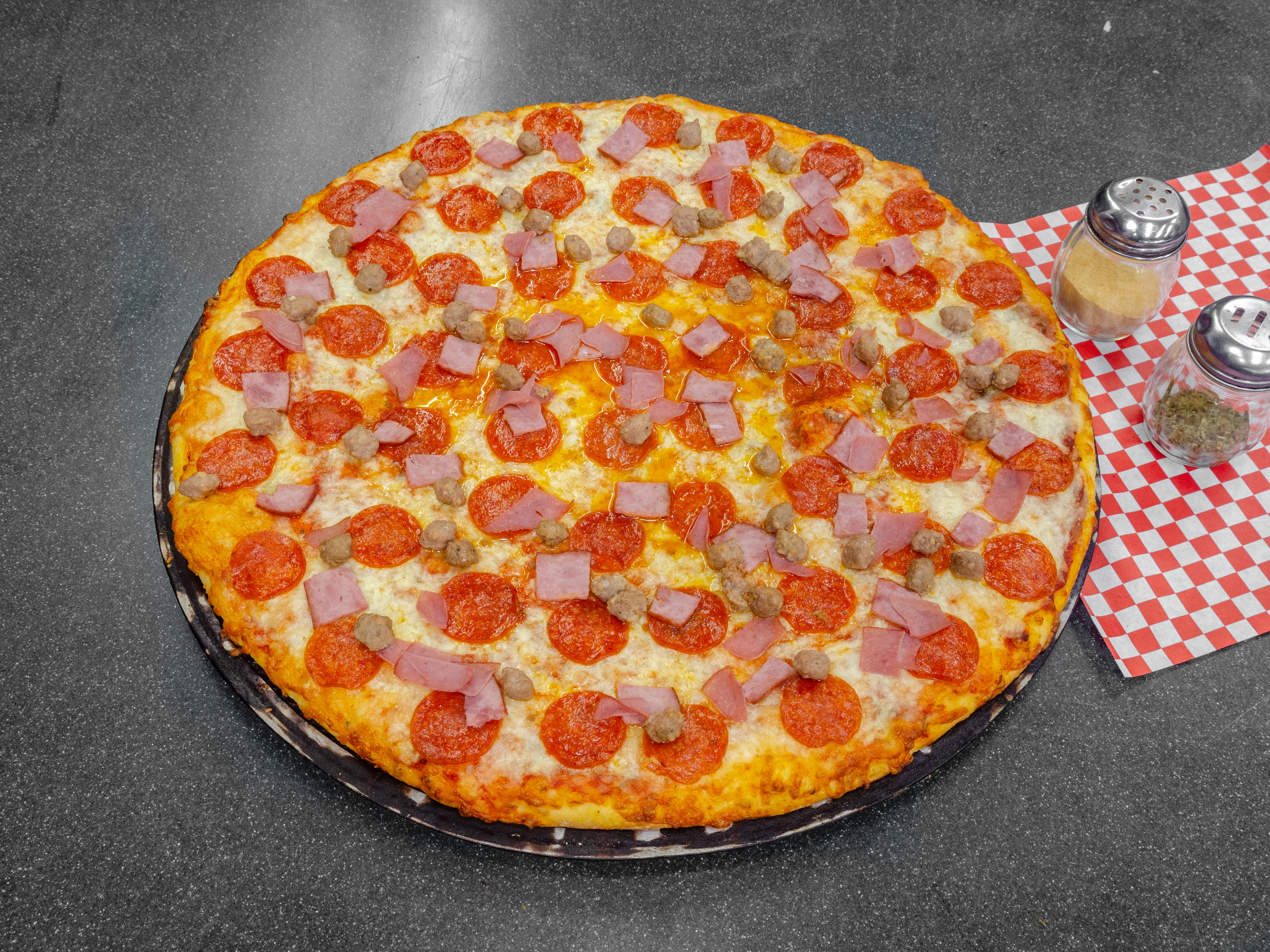 Order 4 Meats Pizza food online from Giant Manhattan Pizza store, El Cajon on bringmethat.com