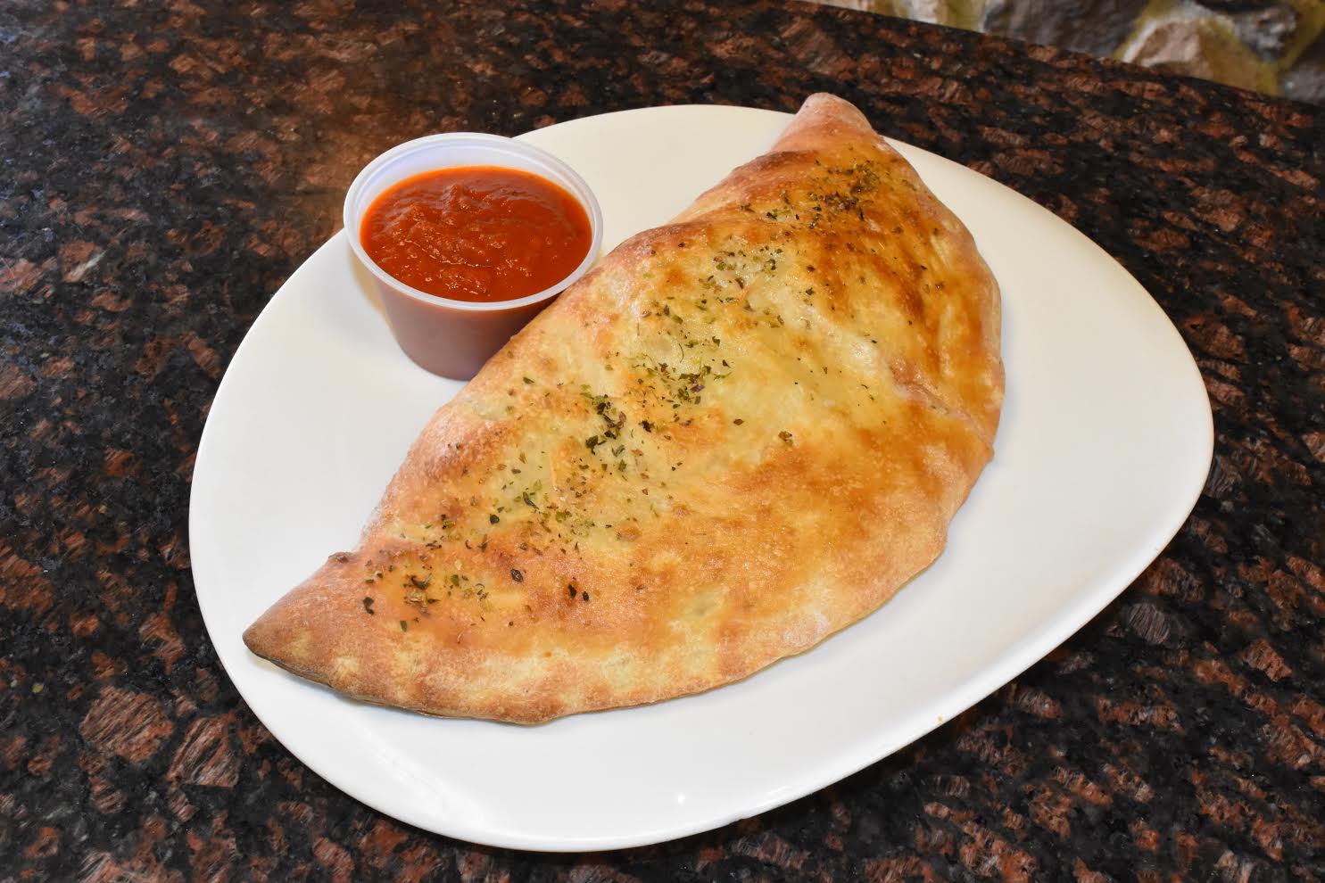 Order Cheese Calzone food online from Giddy's Pizzeria & Restaurant store, East Brunswick on bringmethat.com