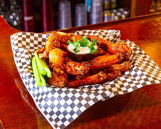 Order Bone-In Wings food online from Caliente Pizza And Draft House store, Pittsburgh on bringmethat.com