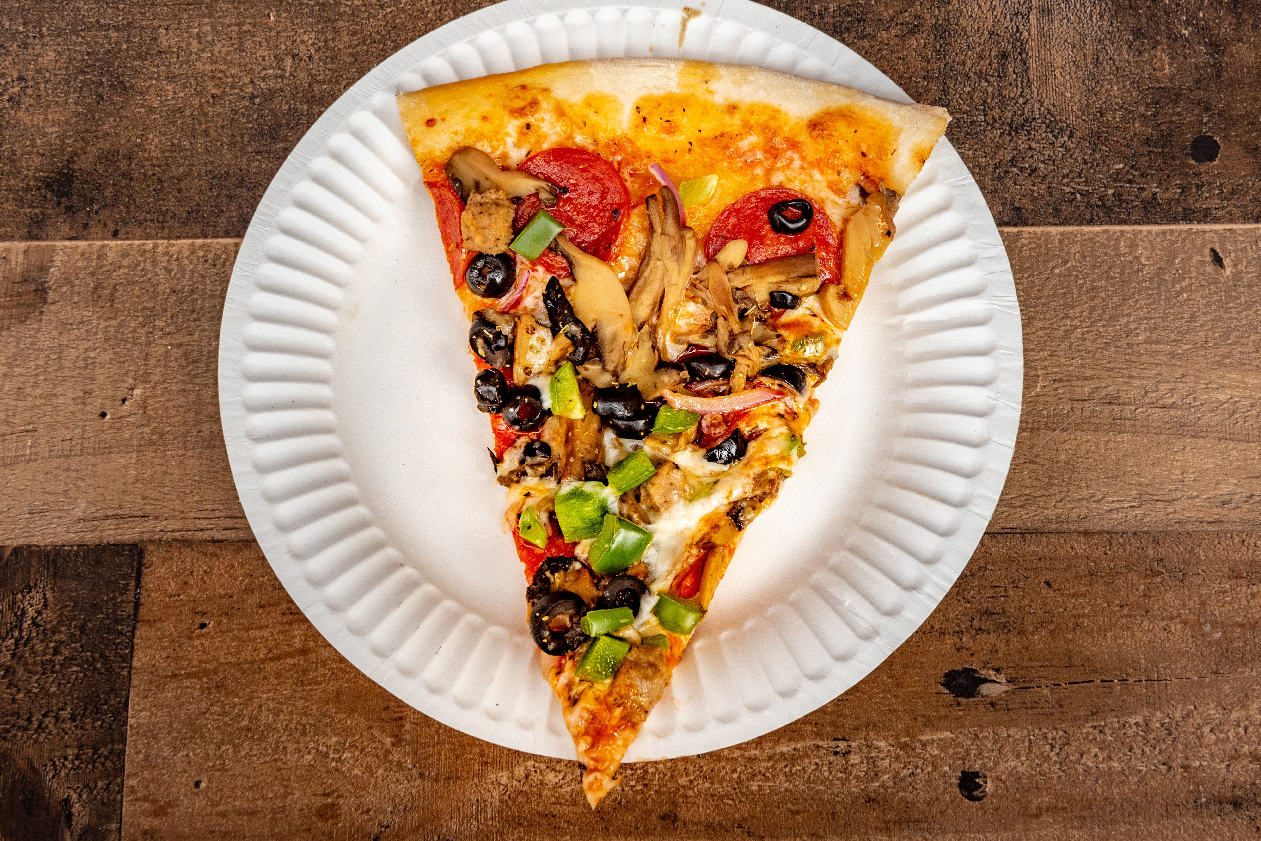 Order Supreme Slice - Slice food online from San Remo Pizzeria store, San Diego on bringmethat.com