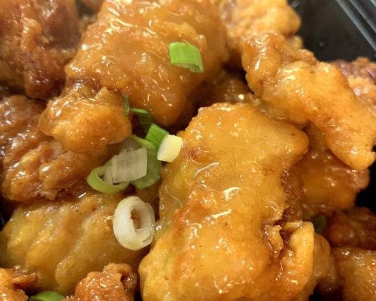 Order Tangy Orange Chicken food online from Thai Towne Eatery store, Orange on bringmethat.com