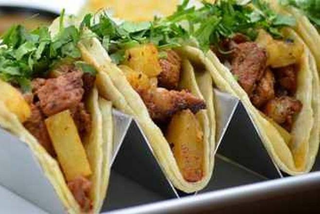 Order Tacos Al Pastor food online from Frontera Mex-Mex Grill store, Stone Mountain on bringmethat.com