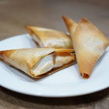Order Coconut Samosa(3) food online from Cosmo Indian Cafe store, Lawrence on bringmethat.com